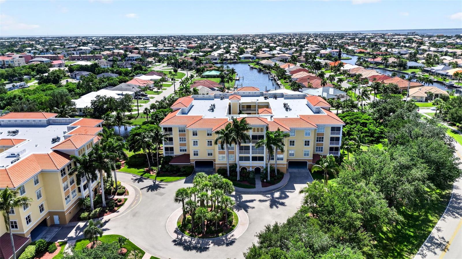 LOCATION, LOCATION, LOCATION!!! Welcome to the exclusive gated community of Fountain Court, where comfort meets resort style living. This beautifully maintained, fully furnished 3-bedroom condo is just minutes from charming shops, waterfront parks, and restaurants in historic downtown Punta Gorda. Enjoy watching wild parakeets and butterflys from your screened in lanai with tree top views and spectauclar sunsets. Offering a spacious floor plan with plenty of room to relax or entertain, this home is perfect as a full-time residence, seasonal retreat, or investment opportunity. For added peace of mind, the condo also features a brand new roll-down hurricane screen, providing convenient storm protection. This residence includes one assigned, under-building parking space for added convenience. Fountain Court offers an exceptional amenity package, including elevators in each building, a heated pool and spa, clubhouse, tennis and pickleball courts, shuffleboard, fitness center, game room, outdoor grilling areas, and a private storage unit located in the parking area. This home offers the Florida lifestlye you desire, paired with the comfort, convenience, and ammenities of a premier community. This is an opportunity you wont want to miss!