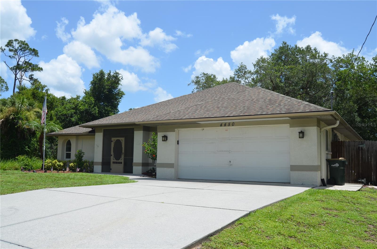 Beautifully maintained home situated in the heart of North Port on a rarely available acre of land! Offering nearly 2,000 square feet of living space, this exceptional property combines privacy, functionality, and convenience. The fully fenced and gated property features access from both sides, providing added security and flexibility. Car enthusiasts, hobbyists, or those needing extra workspace will appreciate the detached outbuilding, ideal for a workshop, storage, or tinkering with projects. In addition, the property includes two separate storage sheds, providing an abundance of space for tools, equipment, seasonal items, and recreational gear—creating the Florida equivalent of a basement, a feature many northern buyers will appreciate. Inside, the home has been freshly painted and is truly move-in ready, featuring tile flooring throughout for easy maintenance, impact windows for added peace of mind, and a newer HVAC system. A whole-house Generac propane generator ensures you'll never be without power during unexpected outages. Situated high and dry in a preferred flood zone where most lenders do not require flood insurance, this property offers additional savings and peace of mind. Ideally located near world-famous Gulf beaches, shopping, dining, the new Costco, and the Atlanta Braves Spring Training facility, this one-of-a-kind property offers the perfect blend of space, comfort, and location. Schedule your private showing today—opportunities like this are rare and won't last long!