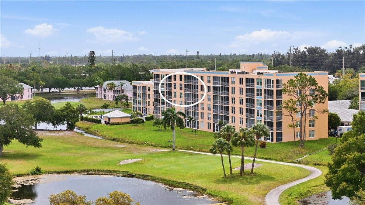 Wake up to panoramic golf course views and embrace the Florida lifestyle you've been dreaming about.

Perched on the 5th floor overlooking the 9th fairway of Pinebrook Golf Course, this beautifully updated 2-bedroom, 2-bath condo offers the perfect blend of comfort, convenience, and year-round sunshine. Whether you're an avid golfer or simply love peaceful green-space views, you'll appreciate watching golfers make their final approach while enjoying your morning coffee from the glass-enclosed lanai.

Inside, you'll find stylish luxury vinyl plank flooring throughout and an updated kitchen featuring granite countertops, creating a fresh, modern feel that's move-in ready. The thoughtfully designed floor plan includes an eat-in kitchen, indoor laundry room, spacious primary suite with a walk-in closet, and abundant natural light throughout.

Golf enthusiasts will love being just a short stroll from the clubhouse and having access to one of the area's most popular public golf courses. Best of all, Pinebrook operates on a pay-as-you-play basis, allowing you to enjoy the game without costly mandatory membership fees.

Additional features include covered carport parking, a private storage locker conveniently located near the elevator, and access to The Greens at Pinebrook's private pool, plus the main community pool and clubhouse amenities.

Perfectly situated near shopping, dining, entertainment, and everyday conveniences, this location also puts Florida's world-famous Gulf Coast beaches just a short drive away. ** Property information received from third-party sources is considered reliable but is not guaranteed. All information should be independently verified by buyers and buyer's agent.