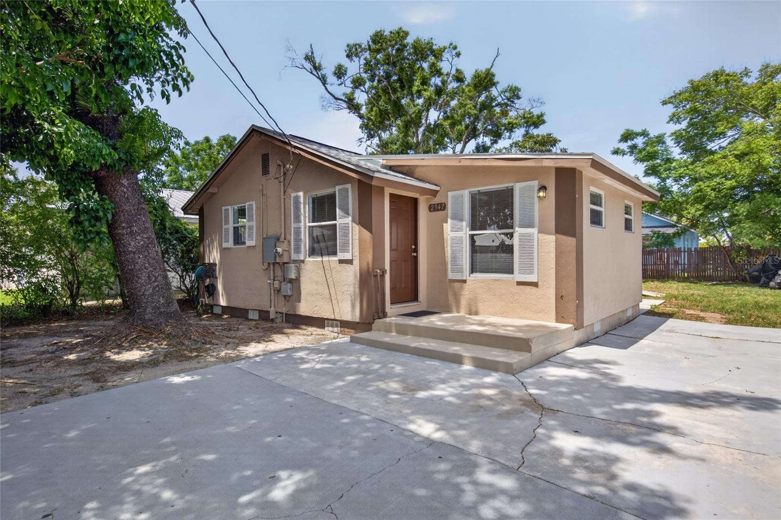 Welcome to this charming three-bedroom, one-bath home offering 864 square feet of comfortable living space in the historic Newtown Heights area, just minutes from the heart of downtown Sarasota. This home offers several important updates for added peace of mind, including a 2023 roof, 2025 AC system, an updated electrical panel installed in 2016, and newer windows. Inside, you’ll find newly installed luxury vinyl plank flooring throughout the main living areas and bathroom, while the kitchen features granite countertops and plenty of potential to make the space your own. Outside, the property includes a raised storage shed in the backyard, providing additional space for tools, equipment, and storage, along with a separate exterior laundry area. Conveniently located approximately two miles from downtown Sarasota, this home offers easy access to shopping, dining, entertainment, area beaches, and I-75 for convenient travel throughout the region. Whether you’re looking for an affordable place to call home or a property with plenty of potential, this Sarasota home is ready for its next owner. Buyer to verify public records for square footage, permitting, and home details.