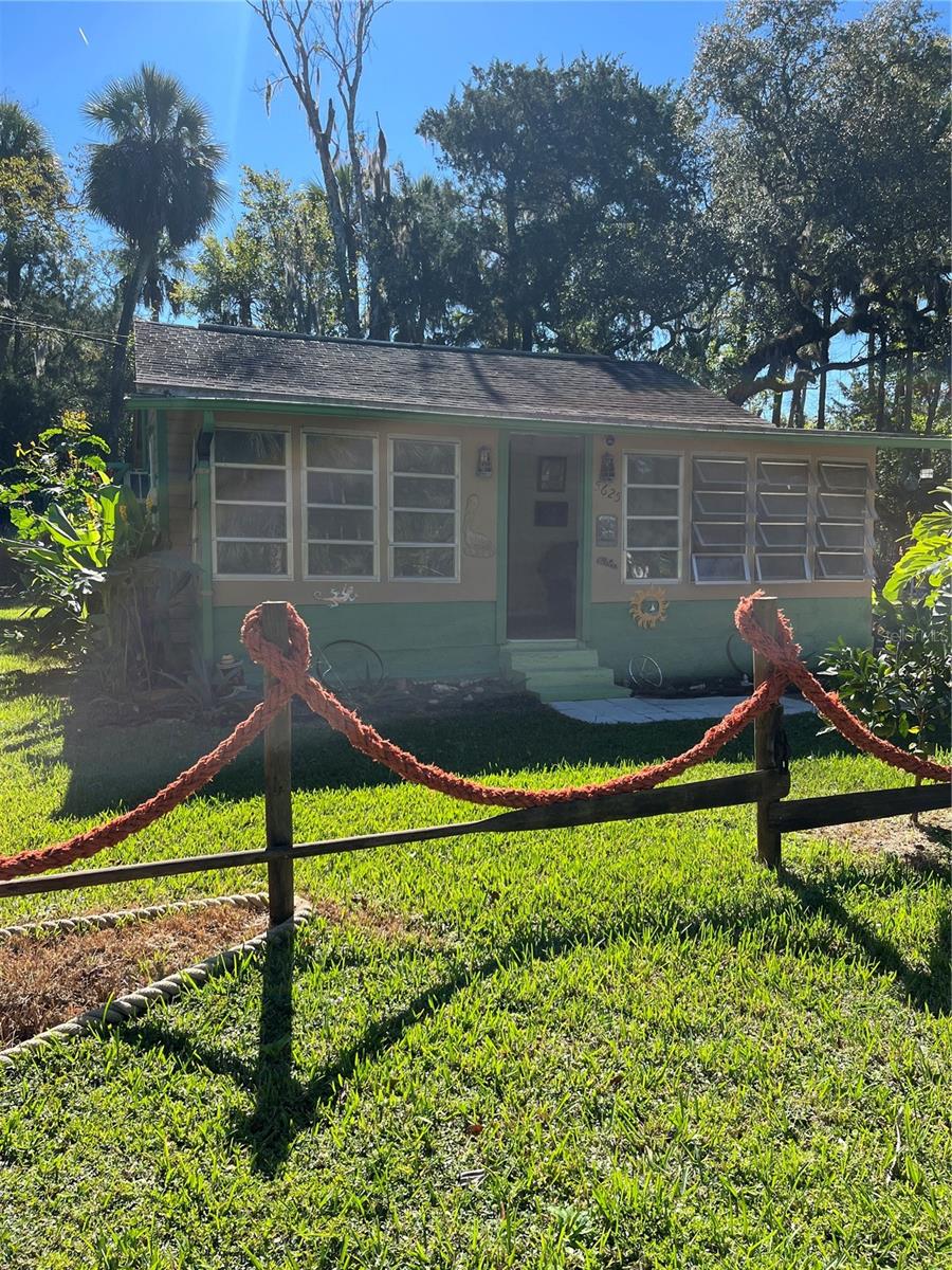INVESTMENT OPPORTUNITY. This unique one bedroom and one bath cabin on 3 LOTS is in the heart of Old Homosassa and is ideal for a fishing weekend get away. Home has an enclosed front porch and enclosed back porch..  Storage shed located on the big open lot.   Head out for a day of fishing in the Gulf of Mexico.  Boat ramp is at the end of S. Mason Creek Rd.  No deed restrictions.  Located in the middle of Homosassa with easy access to shopping, eating and fishing!   BRING YOUR RV OR CAMPER LOT IS SET UP ...GOLF CARTS ALLOWED,,,CAN BE USED AS A AIRB&B