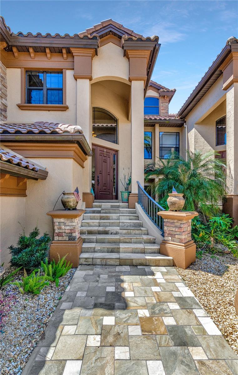 It is here the price adjustment you have been waiting for. Sellers are also offering a one-year home warranty. Enjoy maintenance-free living in this beautifully maintained condominium with pond views as well as golf course views. With its ample square footage, you can park in your private garage and should you desire, take the elevator up to the main floor. As you enter the main living space, the front room is currently an office but once used as a pool room. Designed as a split floor plan, your guest or family members will have their own area with bedrooms 2 and 3 just off the steps. You will be amazed at the size of the rooms and both have walk-in closets. The designated formal dining area is open to the main living area and quite adequate to fit a large table and chairs. The gourmet kitchen has entry from both the dining area and the main living area. With double balcony areas, one off the eating area of the kitchen and the other now a part of the living space as the screens were removed and windows added to make it a great inside-out space, you will have plenty of room to enjoy watching nature and good and bad golfers. End your evenings in the peace and tranquility of the owner's suite with additional space for a sitting area. The owner's bath is updated with travertine and granite. Take a nice soak in the garden bath or a nice hot shower. The grand entrance to the owner's bath is such a splendid sight. The owner's closets also have updates being organized so you can get all the clothes and shoes you don't need in there, with a pull-down for the items stored at ceiling height. Terra Vista community is a golf course community with so many amenities just a golf cart ride away. Enjoy tennis, pickleball, vollyball, and indoor Olympic swimming pool, the fitness center and you won't believe it, a spa! The restaurants are fabulous for fine dining or for a fun night out head over to the Tiki Hut bars. Should you need to leave your community compound just across the street are your banks, grocery store, restaurants and urgent care. Check out the Terra Vista website for this month's activities.
