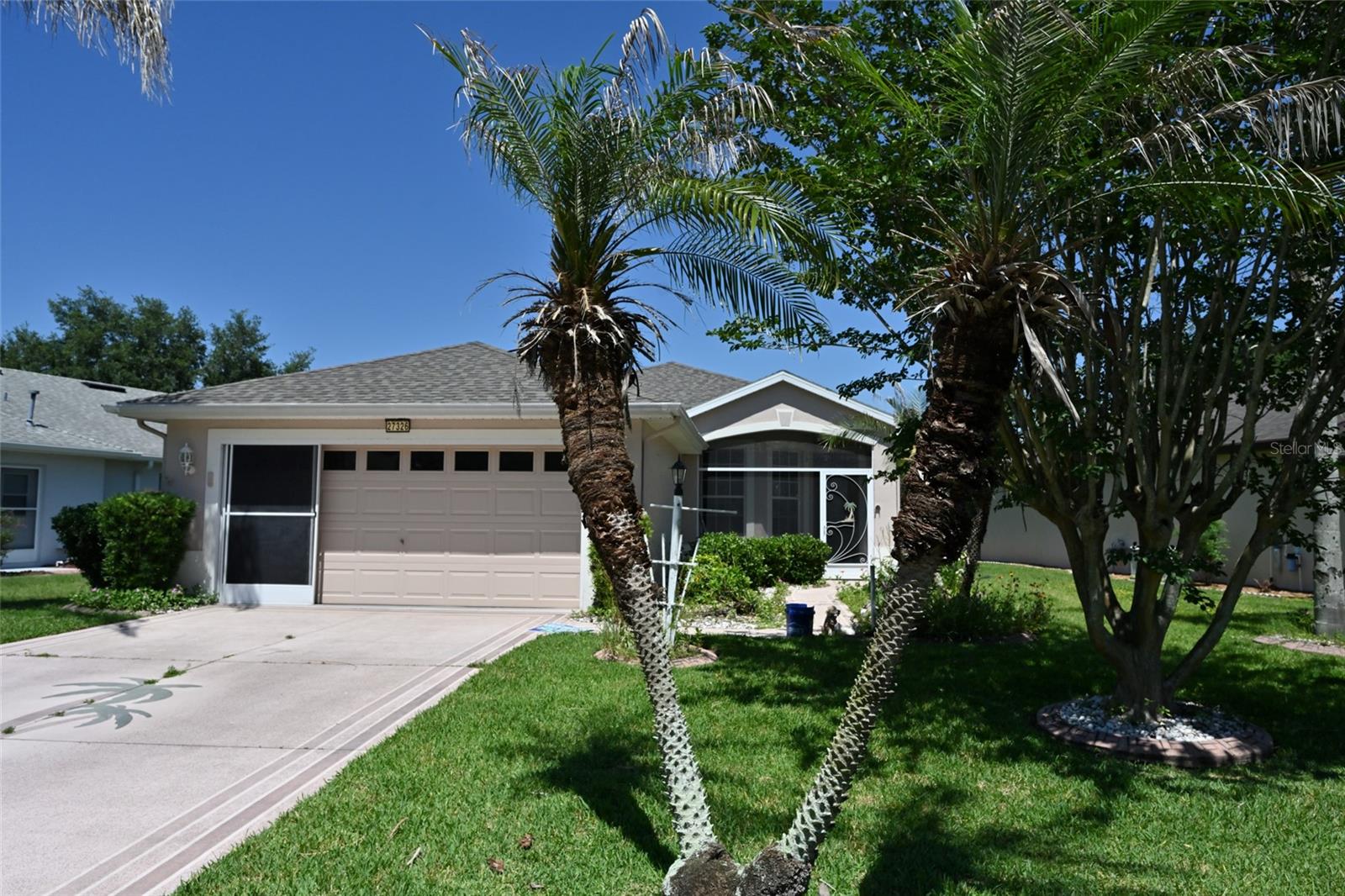 NEW ROOF!!!! This 3 bedroom and 2 bathroom home in the Legacy of Leesburg gated 55+ community.  This lovely home has a screened front front porch.   The eat-in kitchen sits just off to the left, featuring a bay window.   You have a great room dinning and living room combo with a four panel sliding glass door out to the rear screened patio.  On the left side of the great room are the two bedrooms with the secondary bathroom.  The master on suit has sliding glass doors to the screened in patio. A nice nice size walk in closet and a master bath with a garden tub and walk in shower. There are amazing amenities Legacy offers to it's residence is a heated swimming pool, tennis courts, soft ball, billiards, horseshoes, fitness, aerobic, walking trails, etc. and plenty of social activities.  RV and boat storage. Your HOA fees "include" the mowing of your lot and internet and basic cable!
Owner is realtor.