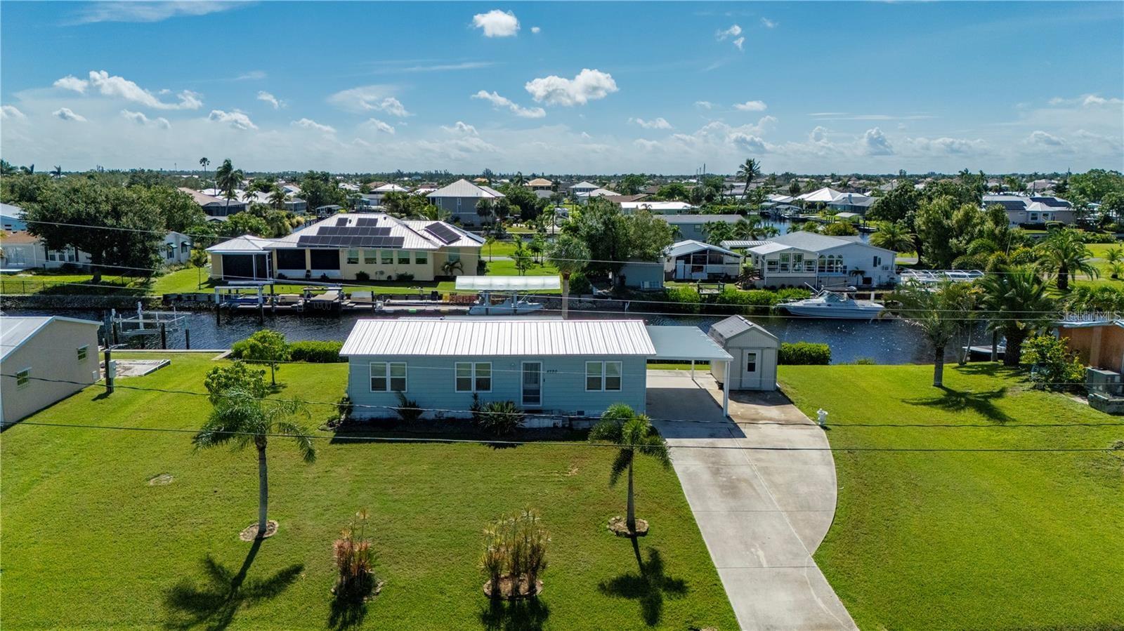 Welcome to this perfectly Florida 2/2 home in the Pelican Pointe subdivision of Punta Gorda. Here you will find a comfortably furnished home sitting on a fabulous sailboat access, saltwater canal. Dock your boat here and prepare for the simple yet extraordinary life you have been dreaming of. Hop on your boat for a sunset cruise out of Alligator Creek and onto beautiful Charlotte Harbor, located just minutes away. Bike a few blocks down to the nearby waterside restaurant for drinks and live entertainment. Every day will feel like a holiday in this no nonsense lease where all you have to do is enjoy. You don't even have to move furniture to get in and start enjoying this beautiful home. Lawn care is included. So come in, and look around at the new waterfront lifestyle that could be your 24/7, 365 dream come true.