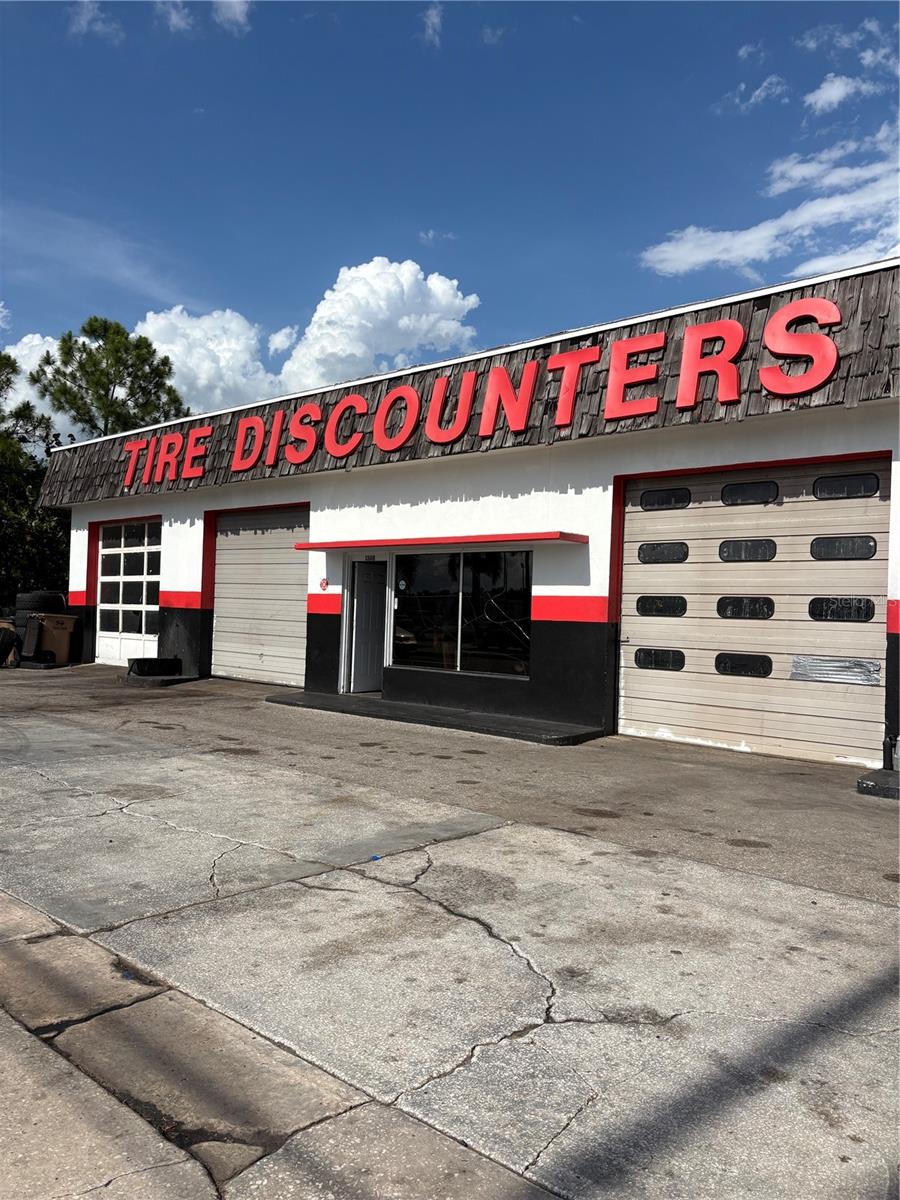 Located along highly traveled Tamiami Trail, this commercial property offers a great opportunity for an owner-user, investor, automotive user, or redevelopment project. Prime land opportunity located on a high-visibility corner lot along a busy highway in a thriving commercial district. Excellent exposure and accessibility make this an ideal location for a new business or future development project. The building features a front reception area, four-bay garage with 12-foot overhead doors, two bathrooms, and two dedicated storage rooms. The property is being sold as-is and presents value-add potential for buyers looking to renovate.

Existing used tire and rim inventory may be negotiable as part of the sale. Conveniently located in the growing Punta Gorda market with strong visibility and access along US-41/Tamiami Trail. All information comes from users and sources that are believed to be reliable, but should be verified for accuracy. Subject to errors and omissions.
