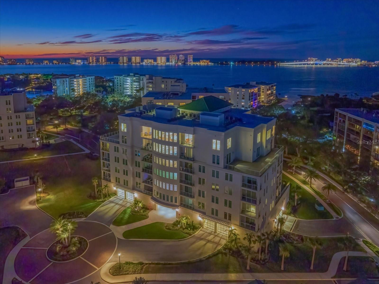 Poised above the Intracoastal Waterway with sweeping vistas of shimmering waters and emerald
fairways, this custom-designed Belleview Place penthouse offers 3,680 sq ft of uncompromising
luxury and refined elegance. Every detail has been meticulously curated, blending sophisticated
craftsmanship with modern comfort to create a residence of exceptional distinction.
Behind grand 10'4" volume ceilings and exquisite crown molding, the home unfolds with
effortless style. Three private ensuite bedrooms—each a serene retreat—are complemented by a
spacious den and an additional elegant half bath, offering versatile living and hosting options.
At the heart of the home, the chef’s kitchen is a showpiece of both beauty and performance.
Appointed with a 42" built-in refrigerator, 36" gas cooktop, built-in oven and microwave, wine
refrigerator, and an expansive walk-in pantry, it’s designed for culinary artistry and effortless
entertaining.
Bespoke finishes elevate every room: engineered hardwood flooring, sleek quartz countertops,
custom closets, and electronic shades. The open living spaces flow seamlessly onto an
extraordinary 28 x 79 private terrace, where breathtaking sunsets, calm coastal breezes, and
panoramic views create a daily sanctuary.
Professionally designed and decorated, the residence is as turnkey as it is timeless. A private
two-car garage provides convenience and security, while Belleview Place’s premier
amenities—including a resort-style pool and state-of-the-art fitness center—enhance the lifestyle
of leisure and exclusivity.
This penthouse is more than a home—it's a statement of luxury, privacy, and elevated living.