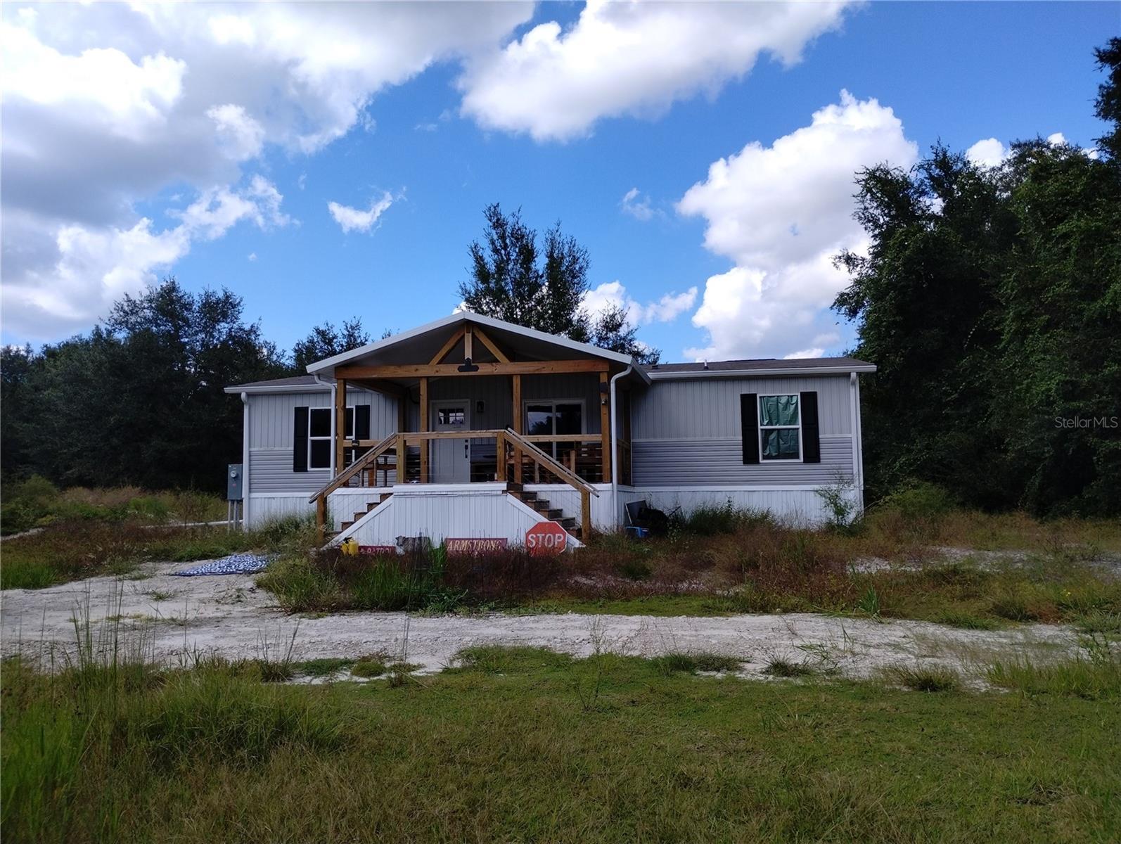 Escape to peace and privacy with this brand-new 2024 Clayton DeSoto home nestled on 10 secluded acres! This spacious 3-bedroom, 2-bath home offers 1,264 sq. ft. of modern living, featuring an open floor plan, stylish finishes, and energy-efficient construction. Enjoy the freedom of country living with no HOA—bring your animals, RVs, ATVs, and boats! There’s plenty of room for all your toys and future projects. Surrounded by nature, this property offers the perfect balance of comfort and seclusion while still being within driving distance of nearby conveniences. Whether you’re looking for a private homestead, a weekend retreat, or a place to live off the beaten path, this one checks all the boxes.