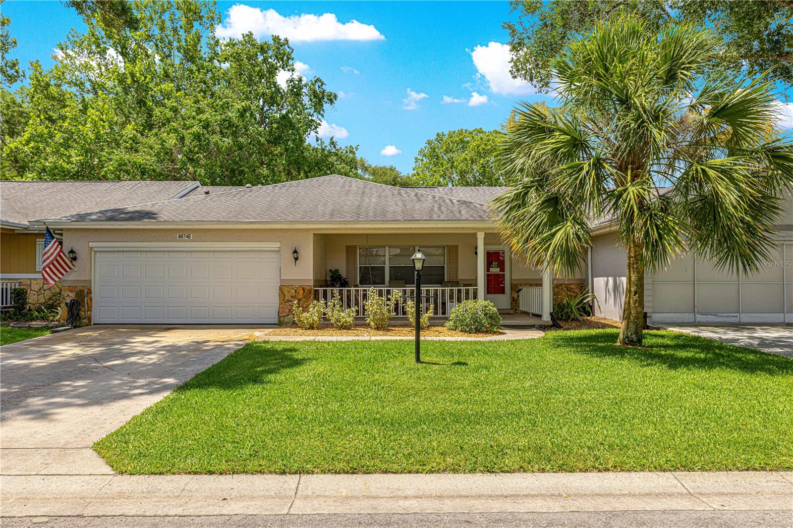 Welcome to this beautifully renovated Augusta model home located in the much sought after 55+ community of On Top of the World. Recent updates include fresh interior paint, modern lighting, ceiling fans, and ample storage—creating a clean, move-in-ready home. Community + Amenities. Enjoy resort-style living with access to multiple clubhouses, swimming pools, fitness centers, pickleball and tennis courts, racquetball, walking trails, and a hobby building. This fully renovated 2-bedroom, 2-bathroom villa offers 1,761 sq ft of thoughtfully designed, low-maintenance living with gorgeous finishes throughout. Step inside to engineered hardwood floors that are in the main living areas, giving a warm and inviting atmosphere. The spacious living room opens to a fully updated kitchen including granite countertops, a large center island, white cabinetry, and stainless steel appliances—perfect for everyday meals and entertaining with family and friends. A light and bright sunroom at the back of the home provides a great area for morning coffee. Just off the sunroom, a versatile bonus room offers flexibility—use it as a third bedroom as it is now or, a hobby space, home office, or den. The generous primary suite is a great retreat, highlighted by a barn door leading to the en-suite bath with dual granite vanities, double closets, a glass-enclosed shower with bench, and a linen closet. The second bedroom is nicely sized with carpet and there is a guest bath with a tub/shower combo and granite vanity. Recent updates include fresh interior paint, modern lighting, ceiling fans, and ample storage—creating a clean, move-in-ready home. Community + Amenities. Enjoy resort-style living with access to multiple clubhouses, swimming pools, fitness centers, pickleball and tennis courts, racquetball, walking trails etc.  This golf cart–friendly community also offers a wide variety of social clubs and activities. The Bottom Line-Quality upgrades, flexible living space, and an unbeatable location in one of Ocala’s most vibrant 55+ communities—don’t miss it. Call for your appointment to view today!