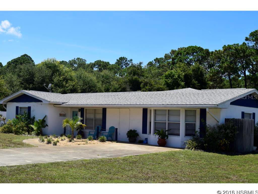 BIG AND BEAUTIFUL HOME ON BIG AND BEAUTIFUL CORNER LOT. THIS CONCRETE BLOCK HOME SHOWS LIKE  NEW.  ALMOST 4000 SQ FT UNDER ROOF GIVES YOU PLENTY OF SPACE WITH A FLOOR PLAN THAT IS PERFECT FOR EVERYONE.LOTS OF CARS BOATS OR TOYS...NO PROBLEM THE  44 BY 24 FT GARAGE WILL HOLD MORE THAN 4 CARS, TOOLS, TOYS OR BECOME THE PLAY AREA OR WORKSHOP OF YOUR DREAMS. THE FLOOR PLAN IS A SPLIT BEDROOM PLAN WITH TWO MASTER SUITES ONE ON EACH SIDE OF THE HOME. ALL THREE BEDROOMS ARE LARGE BUT THE MASTER IS GYNORMOUS. FORMAL LIVING ROOM, FORMAL DINING ROOM AND COZY BUT LARGE FAMILY ROOM MAKE THIS PERFECT FOR ENTERTAINING OR KEEPING EVERYONE HAPPY IN THEIR OWN SPACE. THE EAT-IN KITCHEN HAS LOTS AND LOTS OF NEW CABINETS, NEW APPLIANCES, AND HARD SURFACE COUNTER TOPS. THE INSIDE LAUNDRY ROOM IS ALSO LARGE WITH PLENTY OF ROOM FOR EXTRA STORAGE. THE OVERSIZED CORNER LOT HAS BOAT AND RV PARKING AND PLENTY OF ROOM FOR A POOL. THE LARGE SCREENED LANAI OVERLOOKS THE PRIVACY FENCED BACK YARD WHICH IS PERFECT FOR FAMILY GATHERINGS AND OUTDOOR LIVING. ALL THIS AND THE PROPERTY COMES WITH DEEDED WATER ACCESS TO THE RIVER. A USER FRIENDLY BOAT RAMP IS A SHORT DISTANCE FROM THE HOME. YOU CAN FISH, CANOE, KAYAK OR JUST WATCH THE LARGE VESSELS TRAVELING DOWN THE RIVER. LIVE THE FLORIDA WATERFRONT LIFESTYLE. ;Water: City