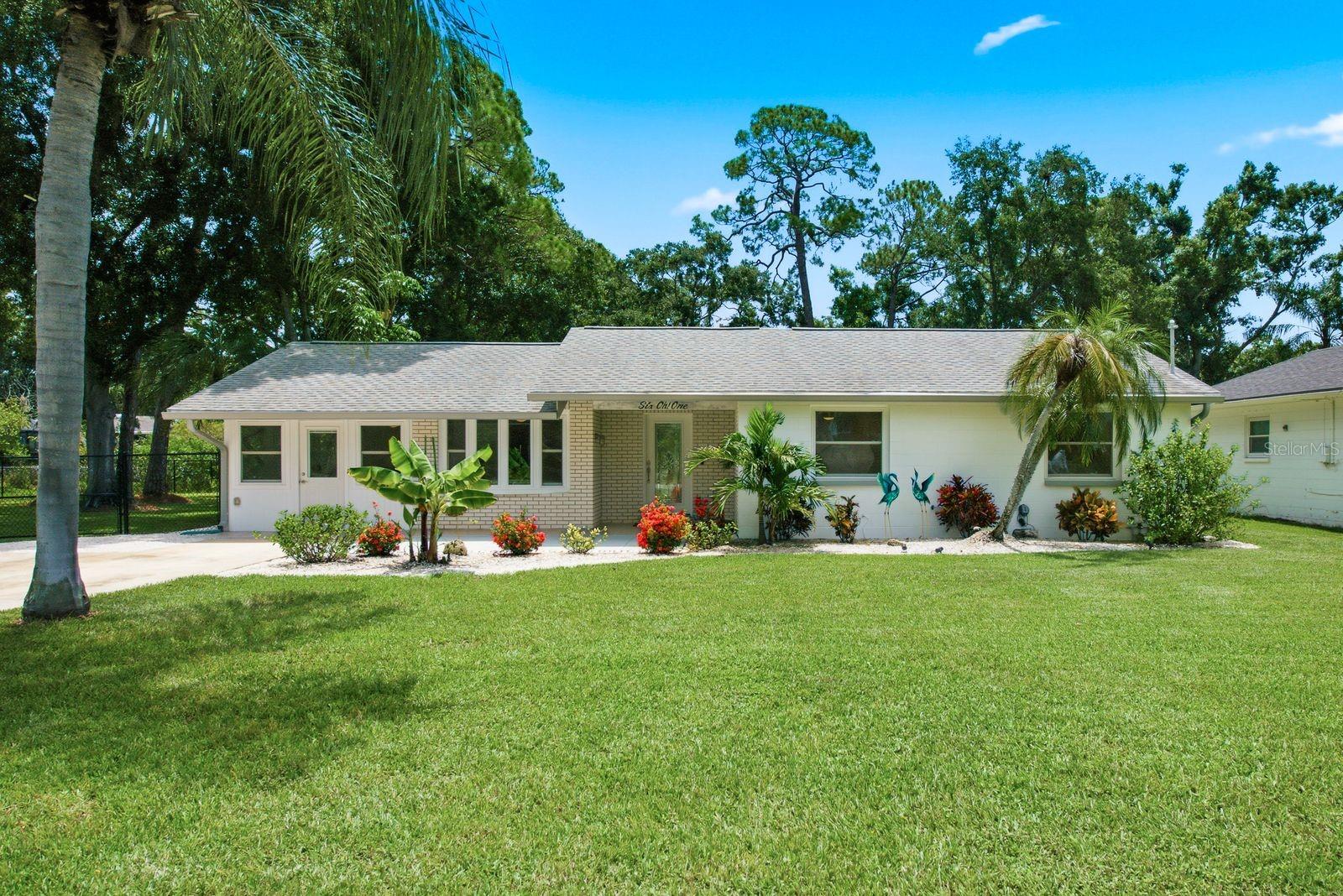 Welcome to this beautifully updated 3-bedroom, 2-bathroom home in the heart of Oldsmar, offering 1,856 square feet of thoughtfully designed living space on an oversized 0.41-acre lot. Featuring a spacious floor plan with a Florida room and dedicated home office, this property provides the perfect blend of comfort and modern upgrades. This home has been extensively upgraded for peace of mind, including a new high-efficiency HVAC system (2023), new electric water heater, complete electrical rewire with updated panel, whole-house plumbing re-pipe, impact-rated exterior doors, LED lighting throughout, high-efficiency ceiling fans, and modern underground electrical service. Natural light fills the home through impact-rated Simonton double-hung windows, complemented by cellular window treatments and blackout blinds in the primary suite. Durable porcelain tile flooring extends throughout the home, creating a seamless and elegant look. The remodeled kitchen is designed for entertaining, showcasing quartz countertops, a stunning clay-fired farmhouse sink, a large,10 ft center island, solid-wood soft-close cabinetry, and modern stainless-steel appliances. The spacious primary suite offers a private retreat with walk-in shower and beautifully updated finishes. Both bathrooms have been tastefully remodeled with premium fixtures, including TOTO and KOHLER features, bidets, and marble countertops. Additional features include a butcher block laundry room workspace, spare garage rated refrigerator, a pull-down attic access with plywood flooring for extra storage, outdoor solar security lighting, front yard irrigation system utilizing reclaimed city water, and low utility costs through TECO services. Step outside to enjoy an expansive, fully fenced backyard with plenty of space for boat or RV parking and a large Tough Shed equipped with 220-volt electrical service, providing endless possibilities for storage, hobbies, or workshop space. Ideally located just minutes from the Oldsmar Trail, numerous parks including R.E. Olds Park and  Mobbly Bayou Beach Park, shopping centers, and a variety of dining options, this exceptional home offers the perfect combination of location, space, and extensive upgrades. Schedule your private showing today!