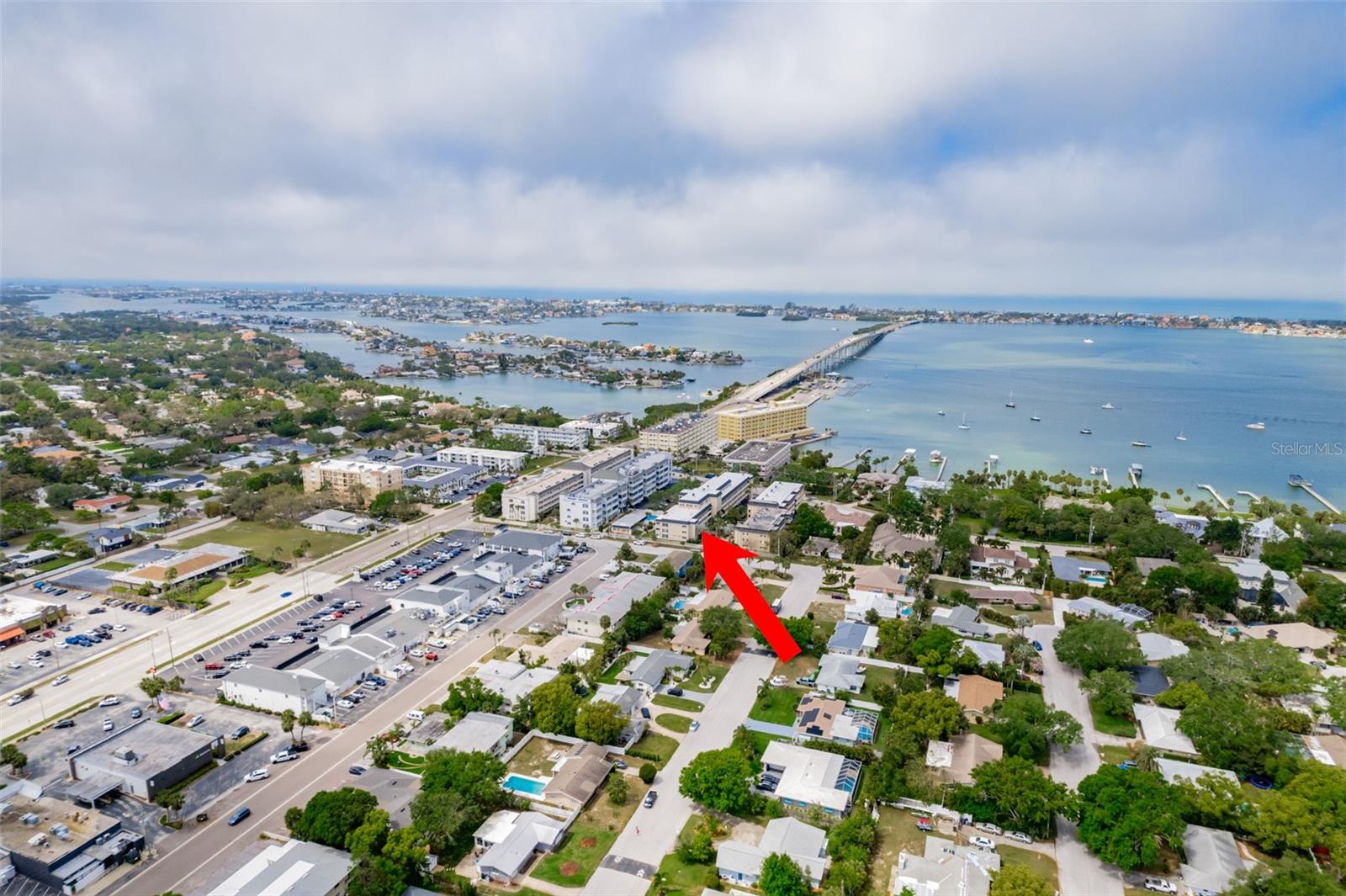 Ready for a new owner!!!! Have you been thinking about relocating close to the beach, but are finding it very hard to find a great - and affordable place? Well then, here is your best chance! Whether you are planning on retiring and living here full-time or just want a nice place to vacation during the cold winter months, this 2-bedroom 2-bath condo designed with over 1,100 sq. ft is for you. Its great design is immediately noticeable. When you enter you will see that your utility closet for the air handler and hot water heater is separated and outside your front door for convenience, efficiency, and safety. This ingenious feature allows more interior closet and storage space inside your condo living area. Also, you can even bring your groceries straight thru the second Front door directly into the kitchen. Large sliding glass doors off the living room lead out to the spacious enclosed and covered patio balcony. Both bedrooms are very spacious with plenty of closet space. The primary bedroom has its own door out to the comfy balcony - enabling you to conveniently enjoy the outdoors anytime. A Community Laundry is on-site.  The pool is heated for your convenience for those few chilly days and there is a large recreation room where you can have gatherings, play pool, games, read and create many great memories.   This GREAT LOCATION offers everything from both local and major brand Stores, Restaurants, Boutiques, Bakeries, etc. For the golf enthusiast Belleair Country Club is minutes away - as well as are other local Golf Courses. Port Belleair Condo is minutes from the areas many nice parks - including Largo Central Park featuring the Performing Arts Center for Entertainment and many other venues. You will never be bored as there is always something fun to do. Furniture can be left for your convenience which makes this move in ready!!!! SELLER MOTIVATED!! MAKE OFFER!!!