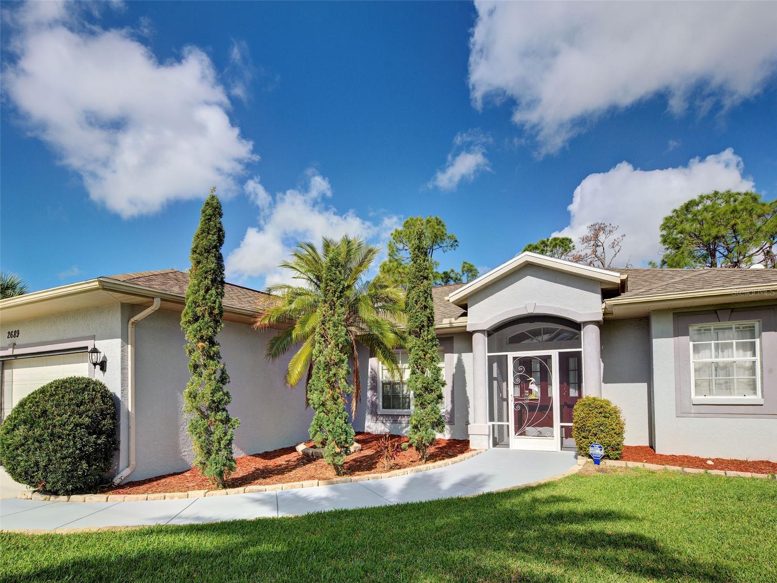 DOUBLE LOT AT  0.46-acre lot, this inviting 3-bedroom, 2-bath home offers space, privacy, and the easygoing Florida lifestyle you’ve been dreaming about. With 1,531 sq ft of living space, the home provides a comfortable layout ideal for both full-time living and seasonal getaways.
Step outside to your private screened pool, the perfect place to enjoy morning coffee, sunny afternoons, or evenings relaxing under the stars. The peaceful backyard backs to a vacant lot, creating additional privacy and a tranquil outdoor setting to enjoy year-round.
The generous yard offers plenty of room for gardening, pets, play, or additional storage, while the irrigation system helps keep the lawn lush and green without added cost.
Snowbirds will especially appreciate that most of the furniture stays, making this an easy move-in ready winter retreat—just bring your suitcase and start enjoying the Florida sunshine.
With no HOA, owners enjoy added flexibility and fewer restrictions.  Well maintained -- AC 4 years, Roof 3 years, water heater 4 years, well American Purification warranty, pool screens March 2025. 
Conveniently located in North Port, you’re close to shopping, dining, and everyday amenities while still enjoying a peaceful residential setting. VA assumable mortgage adds value and seller will contribute to buyers' closing costs and prepaid.