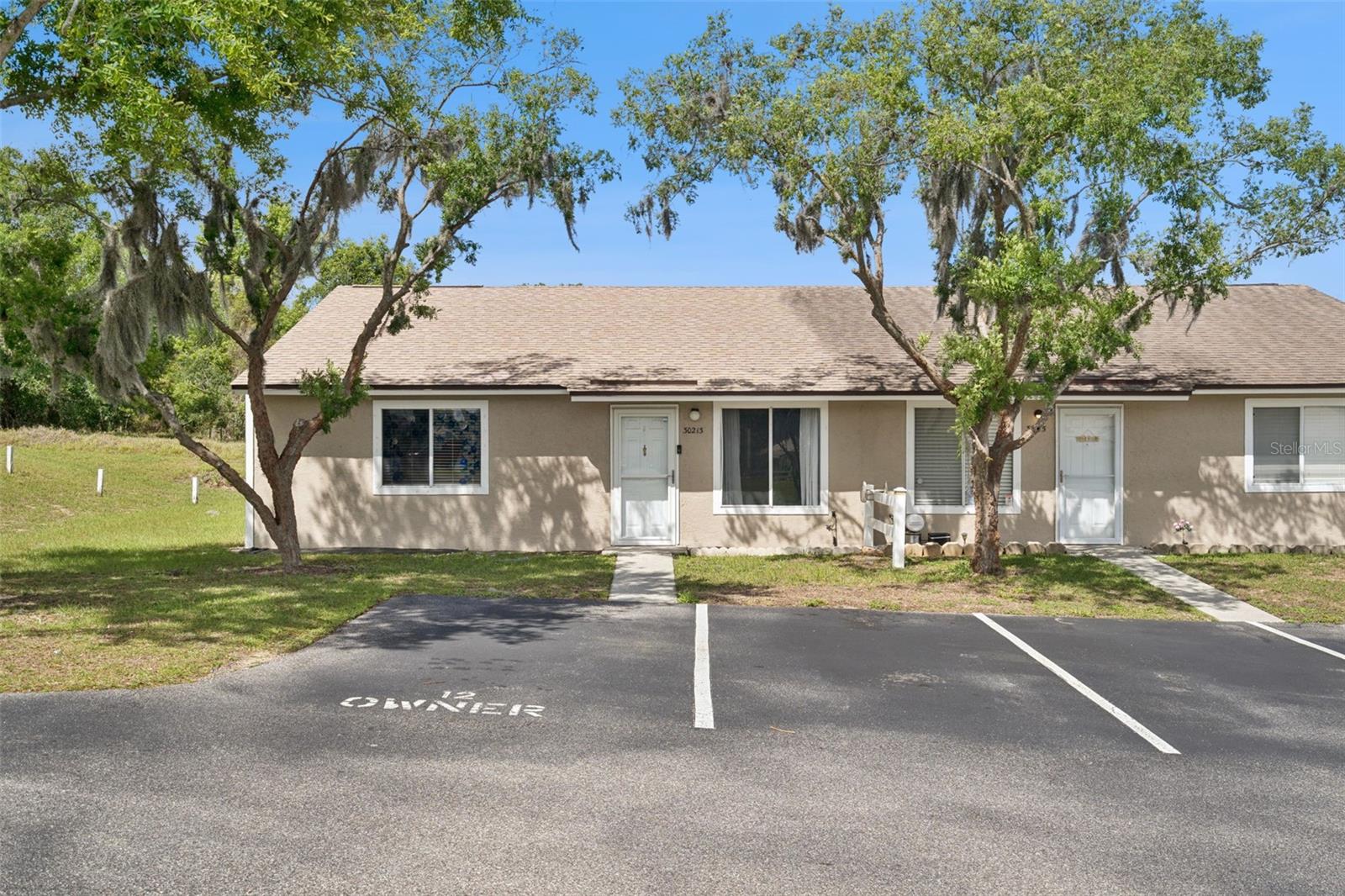Welcome to this 2-bedroom, 2-bathroom end-unit condo offering comfort, convenience, and privacy. With its desirable end-unit location, this home features a spacious and thoughtfully designed layout. The primary suite boasts a generously sized walk-in closet, providing ample storage, while the second bedroom offers flexibility for guests, a home office, or additional living space. The kitchen is equipped with a large pantry, making organization effortless and ideal for those who love to cook. Enjoy year-round relaxation in the enclosed patio, perfect for morning coffee, evening unwinding, or additional living space. Residents also have access to a well-maintained community pool, creating a resort-style atmosphere right at home. Whether you're a first-time buyer, downsizing, or looking for an investment opportunity, this condo combines functionality and comfort in a highly desirable setting.
