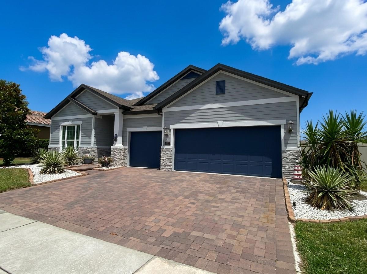 Tucked away in the charming town of Howey-in-the-Hills, this stunning former model home is where elegance, comfort, and the Florida lifestyle come together beautifully. From the moment you arrive, the brand-new glass in the front door, sets the tone for the style and care found throughout this exceptional home. 
Step inside to discover a spacious open floor plan designed for both everyday living and effortless entertaining. The gourmet kitchen sits at the heart of the home, perfectly positioned to overlook the main living areas so you’re always part of the conversation. With 4 bedrooms and 3 full baths, spaced through the home for privacy, there’s room for everyone. New flooring in the bedrooms adds a fresh, modern touch.
The upgrades continue where it counts. The garage features sleek epoxy flooring and built-in storage, while foam insulation in the attic helps maintain cooler temperatures and energy efficiency year-round. The Solar Panels keep your energy costs low. The system was designed to save money from rising energy costs. Enjoy peace of mind with a security system, home sound system, and a termite bond recently renewed with Massey (February 2026).
But the real magic happens out back.
Step through the enclosed, screened lanai and into your private backyard oasis. With no rear neighbors, a fenced yard, beautiful bamboo trees, and other well-kept landscaping,  creating a serene tropical backdrop, this outdoor space is designed for relaxation and fun. Enjoy sunny Florida days in the swim spa/pool, or host unforgettable gatherings on the expansive patio—complete with a gas line already in place for a fire pit. 
Living in Howey-in-the-Hills means enjoying small-town charm with big-city convenience. This scenic community is known for its lakes, golf courses, and peaceful atmosphere, while still being just minutes to Clermont, Mount Dora, Tavares and Leesburg. You’ll find shopping, dining, hospitals, and top-rated schools nearby, you're only 6 minutes from the turnpike entrance,  and you’re only about 35–40 minutes from Orlando, world-famous attractions, and Orlando International Airport. Howey-in-the-Hills offers a peaceful and relaxed environment with generally low noise levels throughout the area. Overall, this town presents a calm setting with convenient amenities for comfortable and convenient living.
Whether you're relaxing in your backyard retreat, entertaining friends, or exploring Central Florida, this home delivers the lifestyle people dream about.
203 Messina Place isn’t just a home — it’s your piece of paradise.