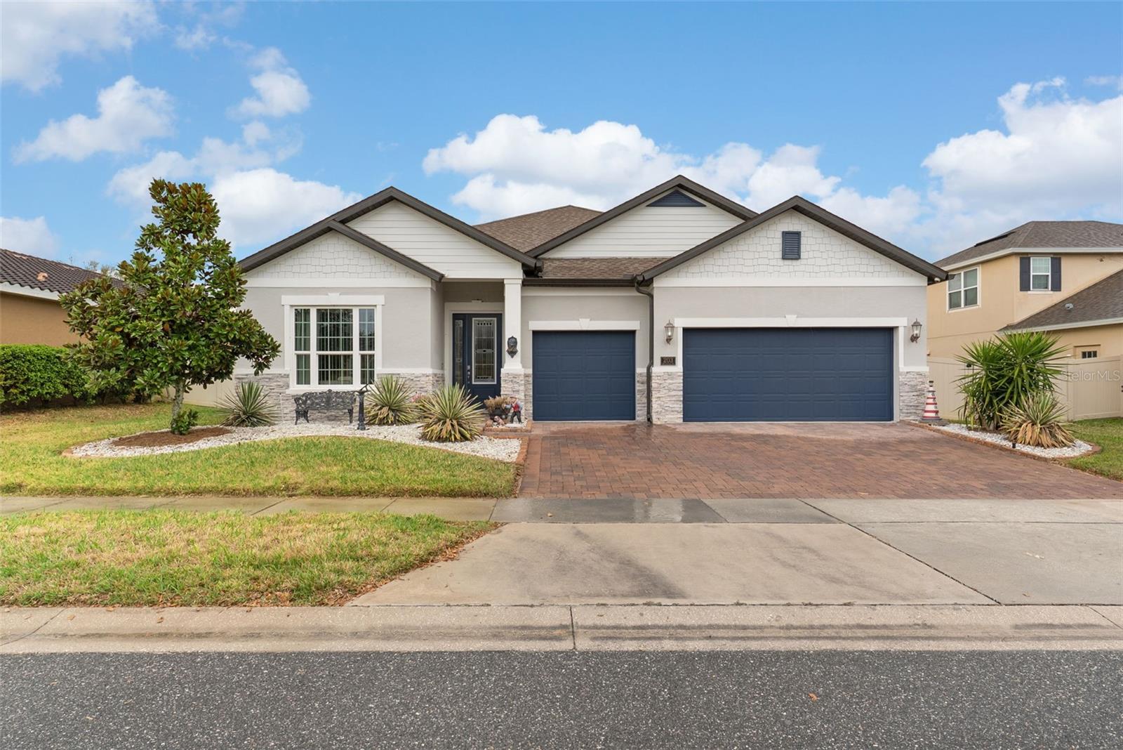 Tucked away in the charming town of Howey-in-the-Hills, this stunning former model home is where elegance, comfort, and the Florida lifestyle come together beautifully. From the moment you arrive, the brand-new glass in the front door, sets the tone for the style and care found throughout this exceptional home. 
Step inside to discover a spacious open floor plan designed for both everyday living and effortless entertaining. The gourmet kitchen sits at the heart of the home, perfectly positioned to overlook the main living areas so you’re always part of the conversation. With 4 bedrooms and 3 full baths, spaced through the home for privacy, there’s room for everyone. New flooring in the bedrooms adds a fresh, modern touch.
The upgrades continue where it counts. The garage features sleek epoxy flooring and built-in storage, while foam insulation in the attic helps maintain cooler temperatures and energy efficiency year-round. The Solar Panels keep your energy costs low. The system was designed to save money from rising energy costs. Enjoy peace of mind with a security system, home sound system, and a termite bond recently renewed with Massey (February 2026).
But the real magic happens out back.
Step through the enclosed, screened lanai and into your private backyard oasis. With no rear neighbors, a fenced yard, beautiful bamboo trees, and other well-kept landscaping,  creating a serene tropical backdrop, this outdoor space is designed for relaxation and fun. Enjoy sunny Florida days in the swim spa/pool, or host unforgettable gatherings on the expansive patio—complete with a gas line already in place for a fire pit. 
Living in Howey-in-the-Hills means enjoying small-town charm with big-city convenience. This scenic community is known for its lakes, golf courses, and peaceful atmosphere, while still being just minutes to Clermont, Mount Dora, Tavares and Leesburg. You’ll find shopping, dining, hospitals, and top-rated schools nearby, you're only 6 minutes from the turnpike entrance,  and you’re only about 35–40 minutes from Orlando, world-famous attractions, and Orlando International Airport. Howey-in-the-Hills offers a peaceful and relaxed environment with generally low noise levels throughout the area. Overall, this town presents a calm setting with convenient amenities for comfortable and convenient living.
Whether you're relaxing in your backyard retreat, entertaining friends, or exploring Central Florida, this home delivers the lifestyle people dream about.
203 Messina Place isn’t just a home — it’s your piece of paradise.