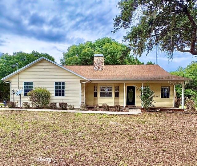 Welcome to your own private slice of paradise in Lake Placid! USDA eligible and offering the possibility of 100% financing for qualified buyers, this charming ranch-style home sits on 1.73 beautifully secluded acres, providing the perfect blend of comfort, privacy, and country living with no HOA restrictions. Surrounded by the natural beauty and tranquility that make Lake Placid so desirable, this property offers the space and freedom you've been searching for.

This well-maintained home features numerous updates throughout, including a newer roof, HVAC system, water heater, and whole-house water treatment system, providing added peace of mind for years to come.

Step outside and discover exceptional outdoor living spaces designed for both relaxation and entertaining. Unwind in the spacious enclosed patio or gather with family and friends around the built-in outdoor fireplace on the open patio, creating the perfect setting for enjoying Florida's beautiful weather year-round.

With 1.73 acres of usable land, there is plenty of room to spread out and enjoy the outdoors. The property also features a chicken coop and a massive detached garage/workshop with garage doors on both ends, offering convenient drive-through access. Whether you need space for boats, ATVs, tools, equipment, recreational vehicles, or hobbies, this versatile building provides endless possibilities.

Conveniently located just off State Road 70 and only a short drive to Highway 27, you'll enjoy easy access to shopping, dining, and everyday conveniences while still appreciating the peace and privacy of country living. Nearby lakes offer opportunities for fishing, boating, and outdoor recreation, making this property an ideal retreat for those seeking space, flexibility, and the best of Florida living.