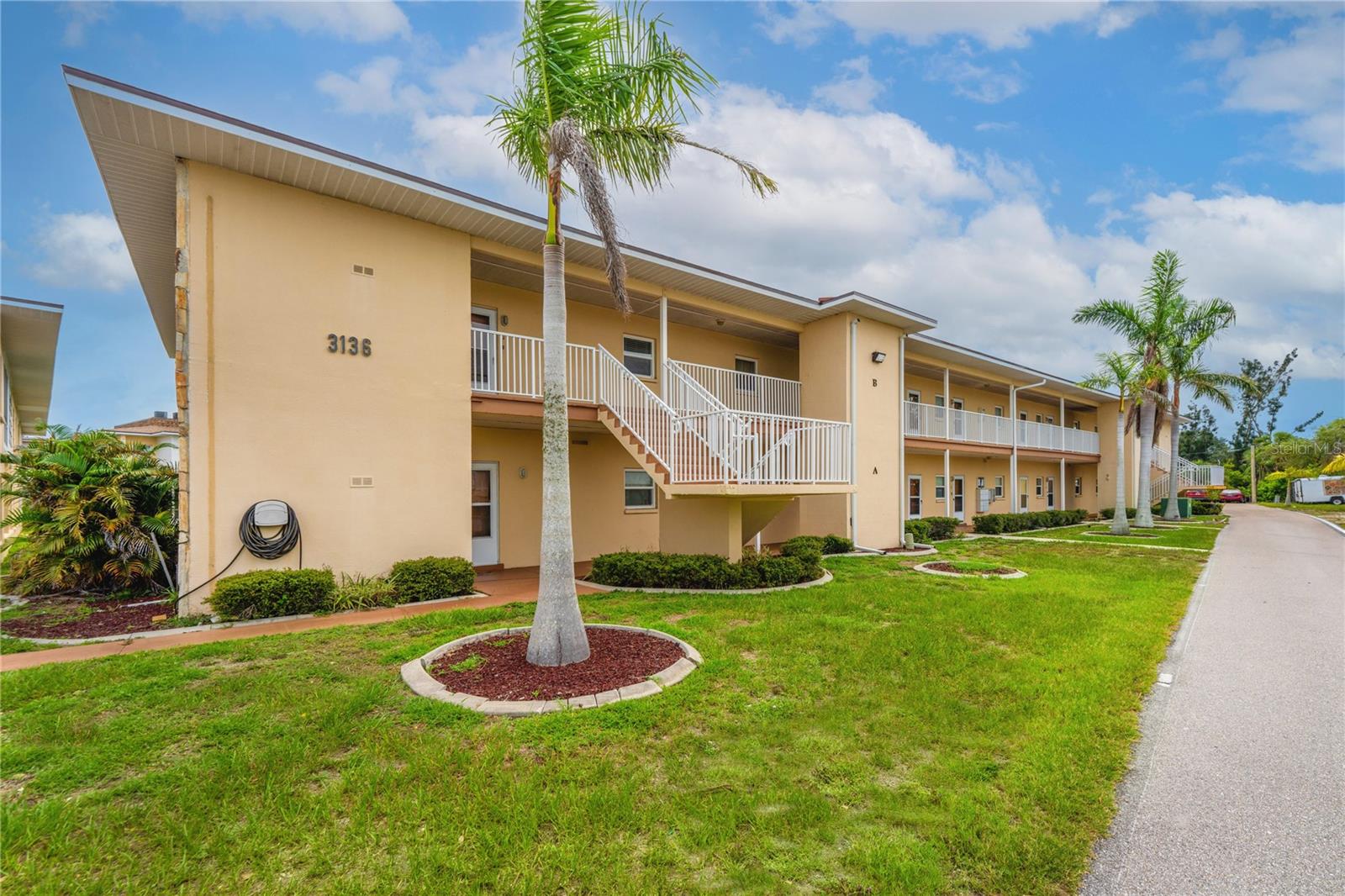 Great News!! The owner has decided NOT to lease but to Re-List for a massive discount of $40,000. He is ready to sell!! This condo is perfect for anyone wanting to purchase a magnificent home for a great price or investors interested in a rental property. It is a second-floor end unit fully renovated, so move-in ready. You will not have to deal with anyone living above you! It is up to code with all the federal and state lease laws, which means it can be immediately leased out with no "get ready" expenses. The monthly fees are a low $361 per month. The AC was replaced in 2021; the water heater is brand new in 23'. The roof was just replaced this year. The kitchen was gutted, and everything is brand new, from the cabinets to the granite countertops; the appliances are all stainless steel, and there is a new under-mounted stainless sink and faucet with garbage disposal—all new ceiling fans in every room, plus new blinds. Every wall was painted a beautiful, soothing pale grey. The main bedroom has an ensuite bath and a large walk-in closet. As an amazing bonus, there is a magnificent 19’ x 8’ Florida room.  It is bright and open with window shades installed. This room can be whatever you want, be it a sunroom, office, extra den, or exercise room. I hope you will fully utilize this seller's motivation to sell. Get a tremendous move-in-ready home at a great price! 
He also owns the condo right across the courtyard. A ground floor end unit that is for sale. Check it out as well. 3106 Harbor Blvd. 1A  MLS#A4591619