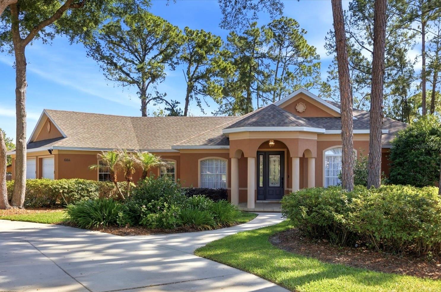NEW PRICE! Tucked away within the gated community of Loch Leven, this thoughtfully updated 4-bedroom, 2.5-bath plus office home offers modern updates, a peaceful canal setting, and an exceptional opportunity in one of Mount Dora's most desirable communities. 

Designed for both comfort and functionality, the split floor plan showcases refined living spaces accented by tasteful contemporary finishes.

The renovated kitchen blends contemporary styling with everyday convenience, including quartz countertops, an expanded center island, 42-inch cabinetry, glass tile backsplash, upgraded fixtures, and a suite of Samsung Bespoke appliances. Additional improvements include a completely remodeled primary bath, contemporary lighting, hardwood flooring in the secondary bedrooms, an interior paint refresh, and a stylish frosted glass office entry, creating the ideal work-from-home setting.

The primary suite offers direct access to the lanai and pool area, while the completely remodeled spa-inspired bath delivers a luxurious retreat with boutique-style illuminated wardrobe storage, a floating dual vessel vanity, large-format porcelain tile, framed mirrors, pendant sconces, glass-enclosed shower, and a separate water closet.

Outdoor living is equally impressive with an expansive screened lanai overlooking the oversized backyard and canal, an inviting pool and spa, grilling area, and generous covered entertaining spaces.

Additional home upgrades include a 2022 roof, newer Rheem 80-gallon commercial-grade water heater, upgraded exterior lighting, Eufy digital entry system, and outdoor grill.

Residents of Loch Leven enjoy an elevated lifestyle surrounded by nature and centered around a private 160+ acre spring-fed lake offering boating, fishing, and more. Community amenities encompass a private dock, tennis and pickleball courts, basketball court, playground, trails, optional RV and boat storage, golf cart-friendly streets, gated entry, and convenient access to major highways, grocery stores, and the charming shops, waterfront parks, dining, and year-round festivals of downtown Mount Dora.

Don’t miss this opportunity. Schedule your private showing today!