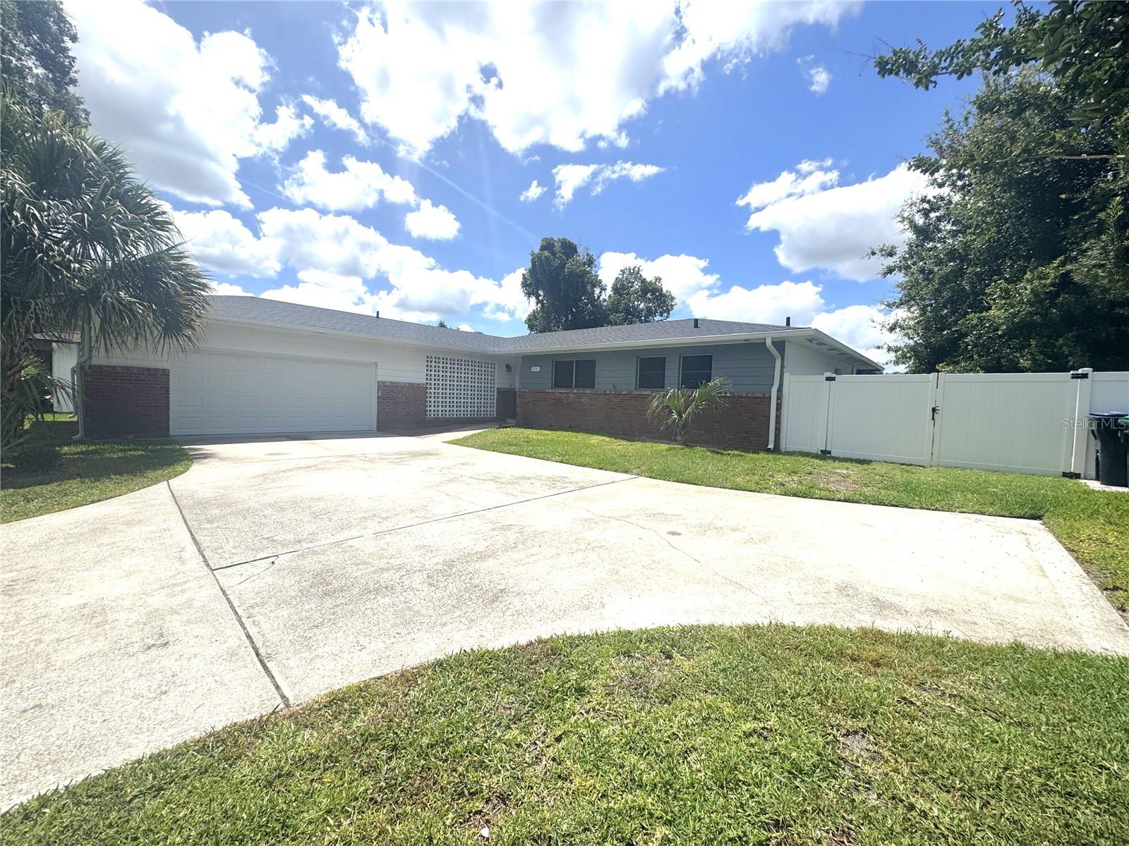 Beautiful 3 bed, 2 bath, POOL home just south of downtown Orlando! Super spacious layout with a large formal living and large dining area.  UPDATED LUXURY VINYL FLOORING THROUGHOUT. Unique utility room addition off of the kitchen provides extra counter/cabinet space, laundry facilities & workstation. All bedrooms tucked away off of the home's hallway. Fenced yard! Convenient location, tons of restaurants, shopping & more!