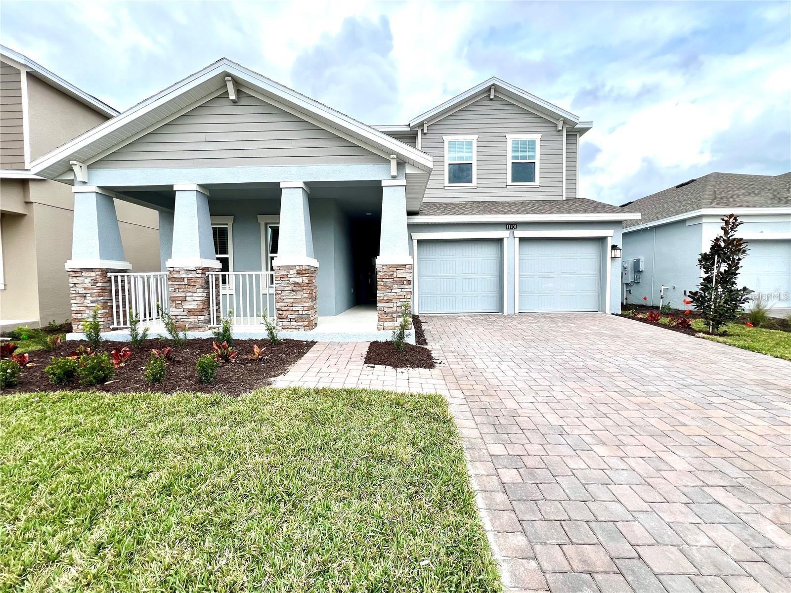 Welcome to your brand-new dream home! This fantastic two-story gem not only offers a spacious Independence II layout with five bedrooms, and three and a half bathrooms but also features a unique first-floor Next Gen® attached apartment for guests or parents or rent with additional income for it. Picture your life in an open-plan kitchen, cozy family room, and a covered patio for those perfect evenings. Upstairs, discover a loft, three bedrooms, an owner's suite, and a handy laundry room. But that's not all – Storey Park is a community like no other in Orlando, with resort-style pools, a Jacuzzi spa, a fitness center, a tennis court, and more. Plus, A-rated schools! This property comes with solar panels to get the best energy bills. Don't miss the chance to be part of Orlando's fastest-growing hotspot. Visit us and make this your home sweet home!