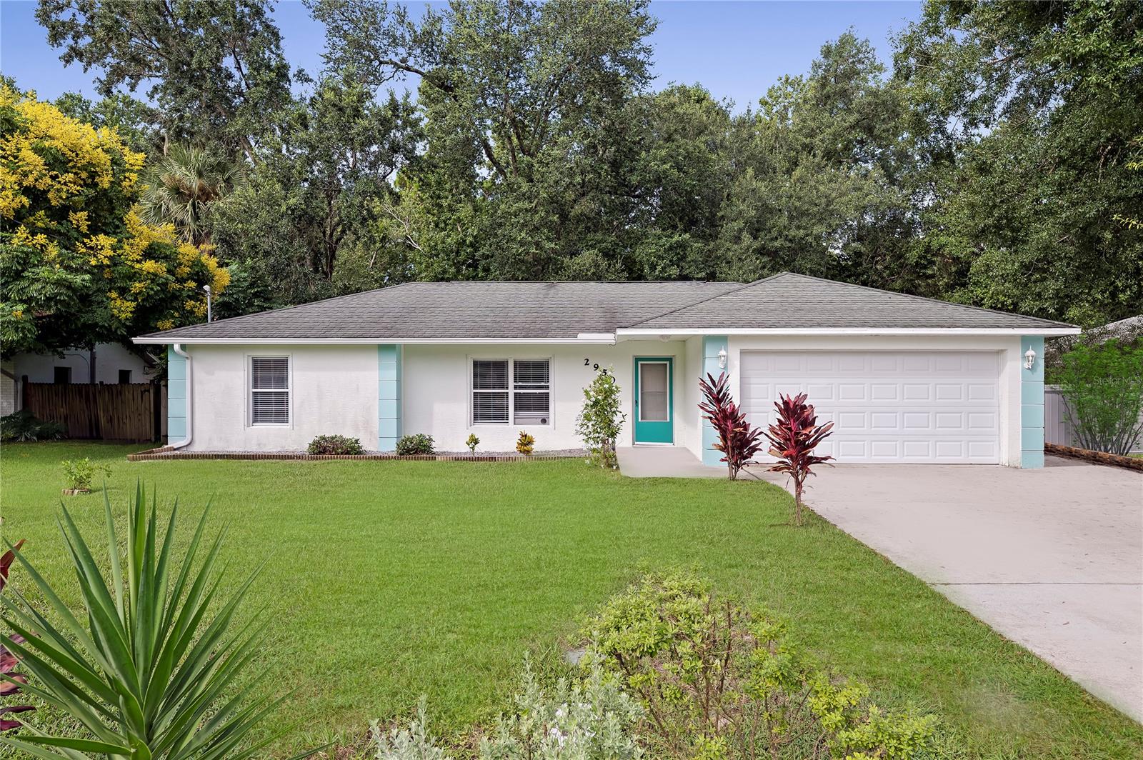 RARE OPPORTUNITY to own one of the most private lots in Edgewater! Situated on a double lot at a dead end, you will immediately notice the hundreds of acres of untouched land behind this 3/2 home - a rare feature in Florida Shores. This home checks off many of the must-haves for buyers in the market today. The main features of this home include concrete block built, split plan floor plan, 2 car garage with openers, tastefully redesigned kitchen, fully fenced yard, quiet neighbors - the list goes on. As you walk in the home you will be greeted with high ceilings that let the sunlight from the large windows and sliders flood into the living space. The space has been tastefully designed with accent walls and a recently updated kitchen. The kitchen/dining room combo features a plethora of cabinets and counter space. The space is perfect for entertaining as the eat in kitchen can comfortably seat three, and steps away is your space for a large dining table if desired. The walls in the home have been freshly painted with a neutral color - ready to be filled with your decorations. The master bedroom is on the opposite side of the guest bedrooms, and includes a large walk-in closet as well as your own ensuite bathroom. On the other side of the house are two roomy bedrooms with large windows and nice closets. The bedrooms share a bathroom which includes a shower/tub combo. You'll make your way into yet another highlight of this home - the private backyard oasis. Once you enter through the sliding glass doors and out onto the patio, you'll immediately notice one thing that sets this home apart from all others in Florida Shores - the PRIVACY. There are no rear neighbors for MILES, and plenty of foliage to separate you from your next door neighbors. This is a true nature-lover's dream as you'll be able to enjoy the various birds, owls, and deer that will be steps away from your property. This home truly has it all. Call today for your private viewing! ;Water: City