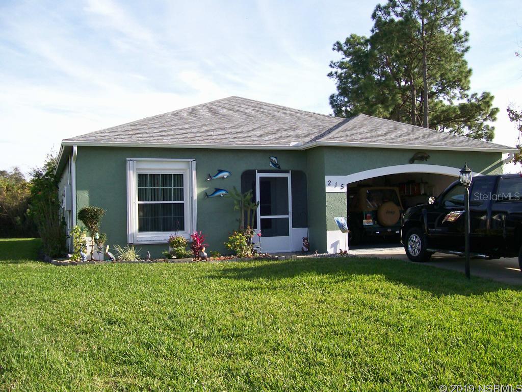 Immaculate and perfect for snowbirds or first time buyers!  Spacious 2 br/2 bath block home  has an open floor plan with 9' ceilings, an enclosed back porch w/ sliding tinted window inserts, pecan hardwood flooring in the living area, warm and welcoming dÃ©cor, hurricane window shields, updated hurricane code windows, irrigation system w/deep well, new heat pump in 2013, sliding screen door in garage, barrier fenced back yard, new range, refrigerator and microwave in 2015, and best of all--a new roof in 2017!  Nicely landscaped--this home shows TLC inside and out.  It is move in ready!  The optional $125 a year fee allows use of the community pool and clubhouse--or the yard is large enough to accommodate your own private pool if desired. ;Water: City