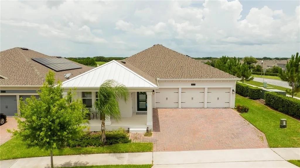 We got a POOL !!!! You'll love the view of the golf course from this beautiful 4 bedroom 3 bathroom home in Panther View...the open concept floor plan offers great natural lighting and is perfect for entertaining guests and family gatherings. The chef's kitchen offers Quartz countertops, beautiful backsplash, stainless steel appliances and 42 inch kitchen cabinets. The large master bedroom features a walk in closet and master bath with dual sinks, garden tub and separate shower. The location is great with easy access to Walt Disney World, Universal Studios, Winter Garden Village, and more! At Innovation at Panther View Manors, nature, beauty & community have come together to create a lifestyle unlike any other!
