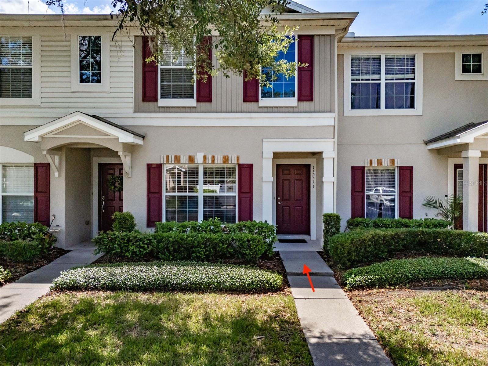 This 2 BR 2.5 bath townhome is located on a conservation lot in Fishhawk Ridge.  Enjoy maintenance free living in this desirable gated community! As you enter the home you are greeted by the spacious dining room. The kitchen offers a smooth top range, plenty of cabinets and countertop space and wood-like tile. The open and airy family room has glass sliders that overlook the conservation area.  There is a powder bath on the first floor as well.  Upstairs, you will find wood flooring- the large primary suite with two walk-in closets and a private bath. The spacious secondary bedroom features a private bathroom. There is a built-in desk area and a laundry closet on the second floor. The extended patio is the perfect spot to watch the wildlife and enjoy your moring coffee with no backyard neighbors. Fishhawk Ridge has a community pool. Fishhawk Ranch offers resort-style amenities, including multiple pools, a fitness center, basketball and tennis courts, playgrounds and parks, a skate park and miles of walking trails.