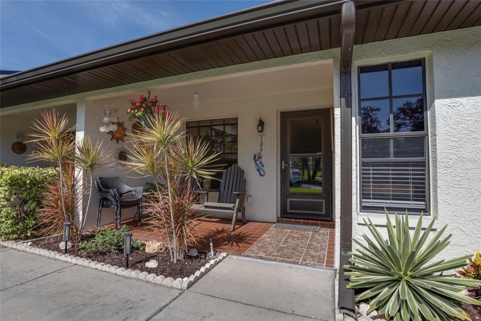 Easy Living at Its Best in Delightful Dunedin!  Welcome Home to this Lovely Villa in Dunedin's Heather Ridge Community!  Fully & Tastefully Renovated 2 Bed/ 2 Bath with an Open & Spacious Layout.  Kitchen Comes all S.S. Appliances & Beautiful Quartz Countertops.  One Reserved, Covered Carport Space Included & Ample Guest Parking!  New Roof ~ 2020, New A/C & Handler ~ 2024. The Low $517/ month HOA Fee Covers Water, Trash, Sewage, Cable, Internet, Lawncare, & Pool Maintenance!  Service Animals Only Allowed in the Development.