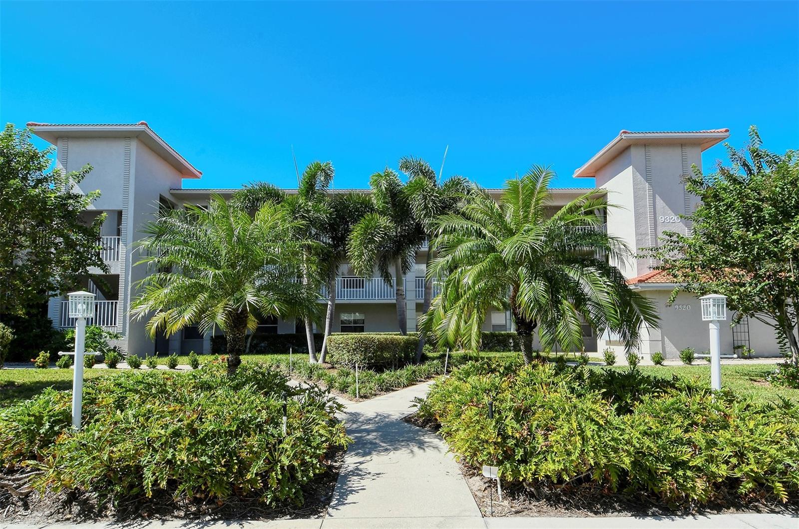 Amazing Views and Updates await the new owner of this top floor unit with glassed-in lanai!  Open floor plan with luxury vinyl throughout and vaulted ceilings.  Total Kitchen remodel with quartzite counters, high-quality stainless steel appliances, new cabinets and sitting area along with large bar top.  Lanai overlooks the Par 3, 2nd hole with never ending views across the preserves past the course. Master bedroom with walk-in closet and its own slider to the lanai. Designer paint colors throughout.  2nd bedroom and bath are separated with a lovely barn door for the guest's privacy.  Clubside Condos offers pickleball/tennis tennis court, community pool and community grills.  One-car carport and additional overflow parking for owners and guests.  A premier member-owned country club, Stoneybrook of Sarasota, is only a short distance from Siesta Key and offers easy access to shopping and borders the Legacy Trail. Ownership in Stoneybrook Golf and Country Club includes an updated clubhouse and restaurant, 18-hole Arthur Hills-designed golf course, Har-Tru tennis facility, well-equipped fitness center and additional club pool and spa.