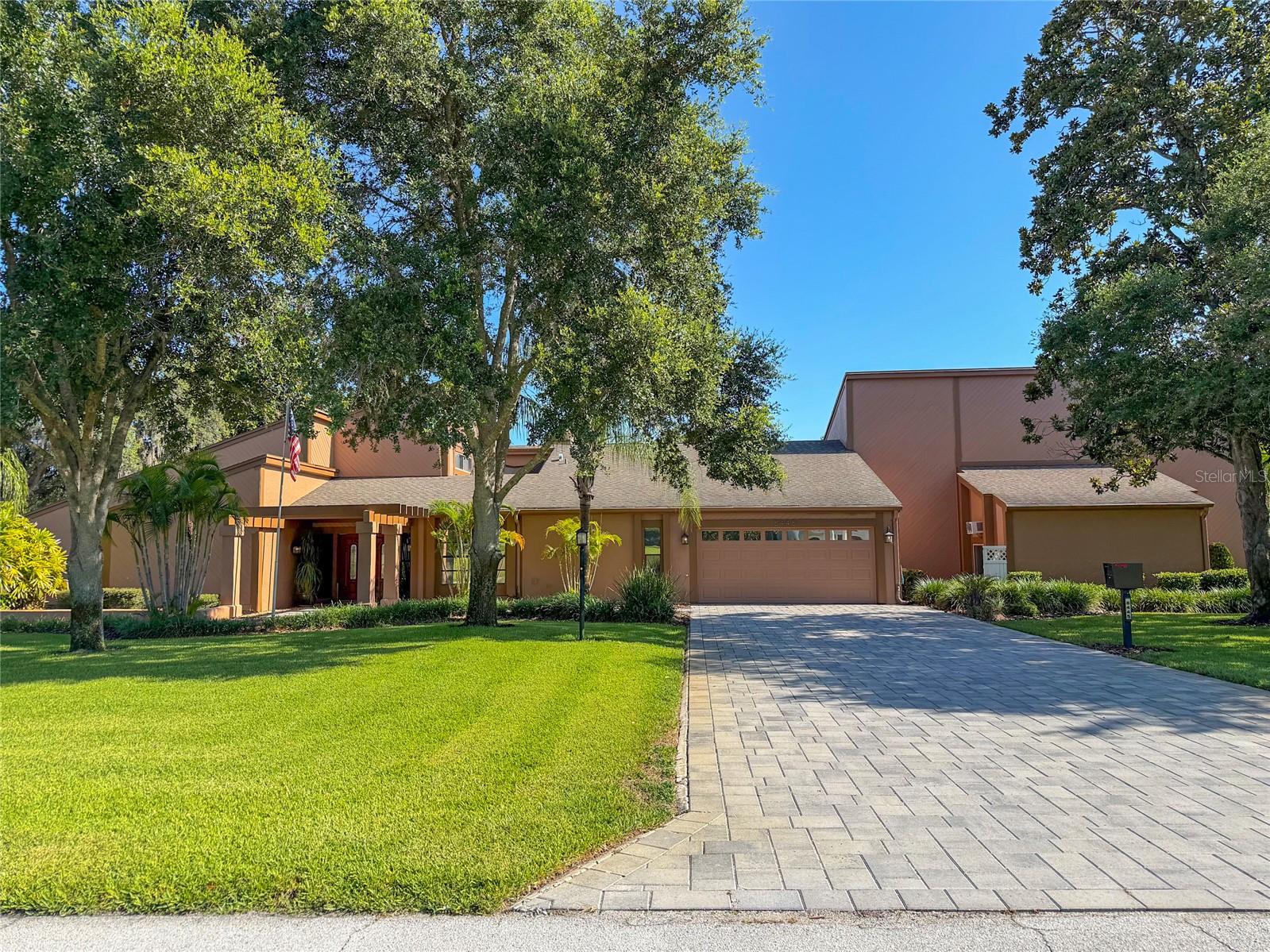 Virtually Staged. Rare Fly-In Estate with Private Aircraft Hangar, Pool & 4,548 SF of Luxury Living. Experience the ultimate aviation lifestyle in one of the county's most desirable fly-in gated communities. This exceptional 4,548-square-foot home sits on a beautifully wooded oversized lot, offering outstanding privacy and direct access to a private 4,400-foot runway. A rare opportunity for pilots seeking the convenience of keeping their aircraft at home. The property features a spacious aircraft hangar with a hydraulic door, making it ideal for aircraft storage and easy access. Join a welcoming community where many fellow pilots call home. Inside, you'll find 4 spacious bedrooms, a dedicated office, a versatile loft, a large family room, and a formal dining room—providing plenty of space for both everyday living and entertaining. The kitchen is equipped with all-new stainless steel appliances, and the home offers a comfortable, functional layout throughout. Step outside to your private backyard oasis featuring a swimming pool, expansive wooded surroundings, and exceptional privacy. The oversized front yard, long backyard, and extended driveway provide ample space for guests and multiple vehicles. Despite its peaceful setting, the home is conveniently located just minutes from shopping, restaurants, medical facilities, major highways, and car dealerships. Enjoy easy access to the beautiful beaches along the Gulf of America, boat rentals, and Anclote Island, located just a few miles offshore. Tampa International Airport is approximately 30 minutes away. If you've been searching for the perfect combination of luxury, privacy, and aviation convenience, this is a property you won't want to miss. Schedule your private showing today—it could be the next place you'll proudly call home.