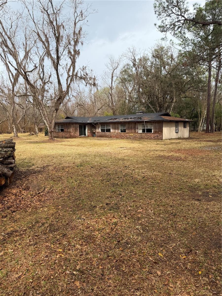 Investor special on 2.03 acres. The existing home is not in livable condition and is being sold AS-IS, offering a prime opportunity for a full renovation, teardown, or new construction. With over two acres of land and plenty of space to work with, this property is ideal for investors, builders, or anyone looking for a project with strong upside potential.