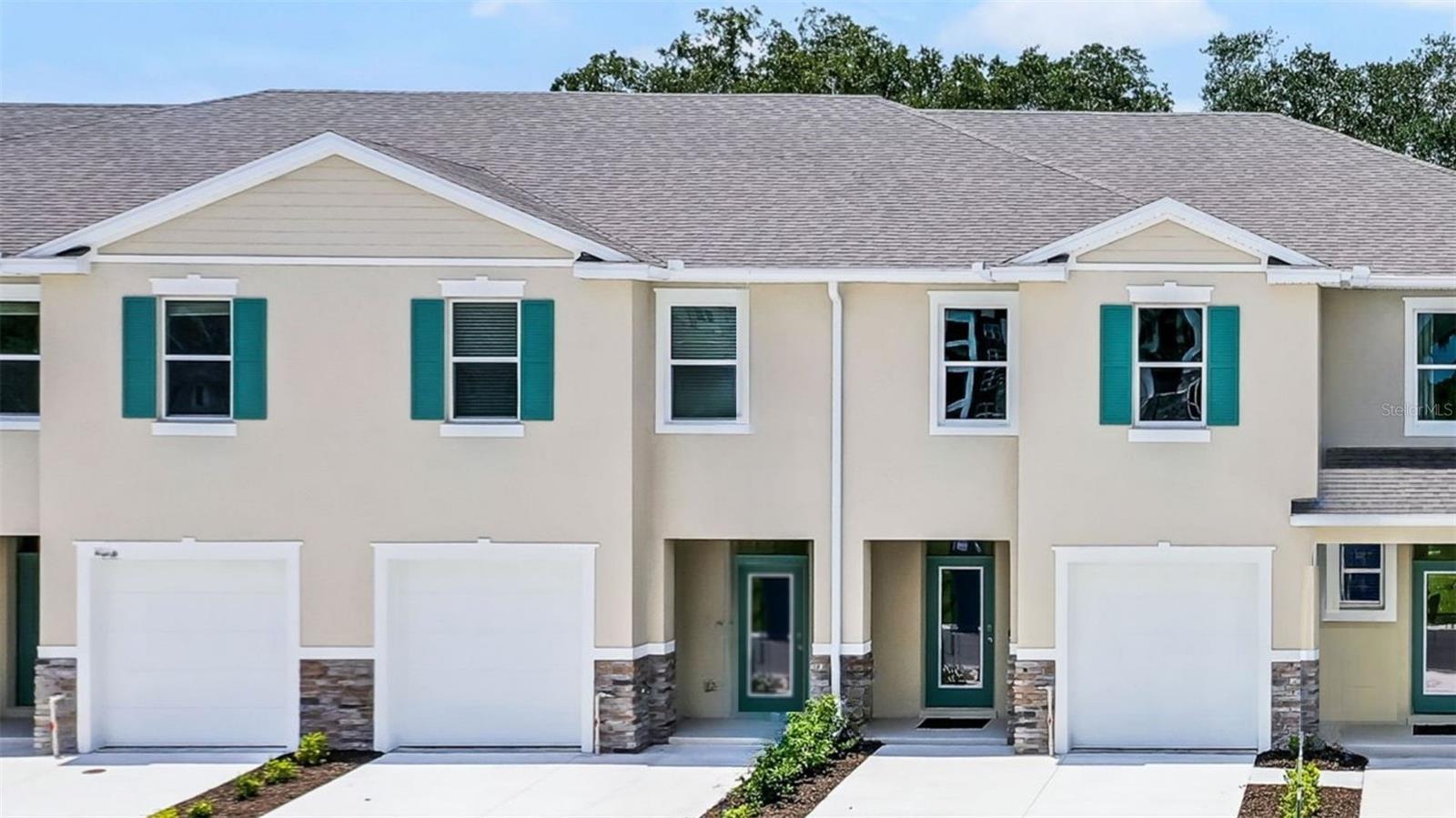 Under Construction. Nona West presents the Glen. This two story, all concrete block construction end unit townhome has an open concept downstairs that includes a spacious kitchen, powder room, and a spacious family room overlooking the covered rear lanai providing great space for entertaining family and friends. The home includes sleek stainless steel appliances. As you head up to the second Floor plan, you are greeted with bedroom one that features an ensuite bathroom, two additional bedrooms, a full bathroom, and a laundry area. Like all homes in Nona West, the Glen includes a Smart home technology package which allows you to control your home with your smart device while near or away. Your new townhome will always have fantastic curb appeal while allowing you time to do the activities your family enjoys most. 

 *Photos are of similar model but not that of exact house. Pictures, photographs, colors, features, and sizes are for illustration purposes only and will vary from the homes as built. Home and community information including pricing, included features, terms, availability and amenities are subject to change and prior sale at any time without notice or obligation. Please note that no representations or warranties are made regarding school districts or school assignments; you should conduct your own investigation regarding current and future schools and school boundaries.*