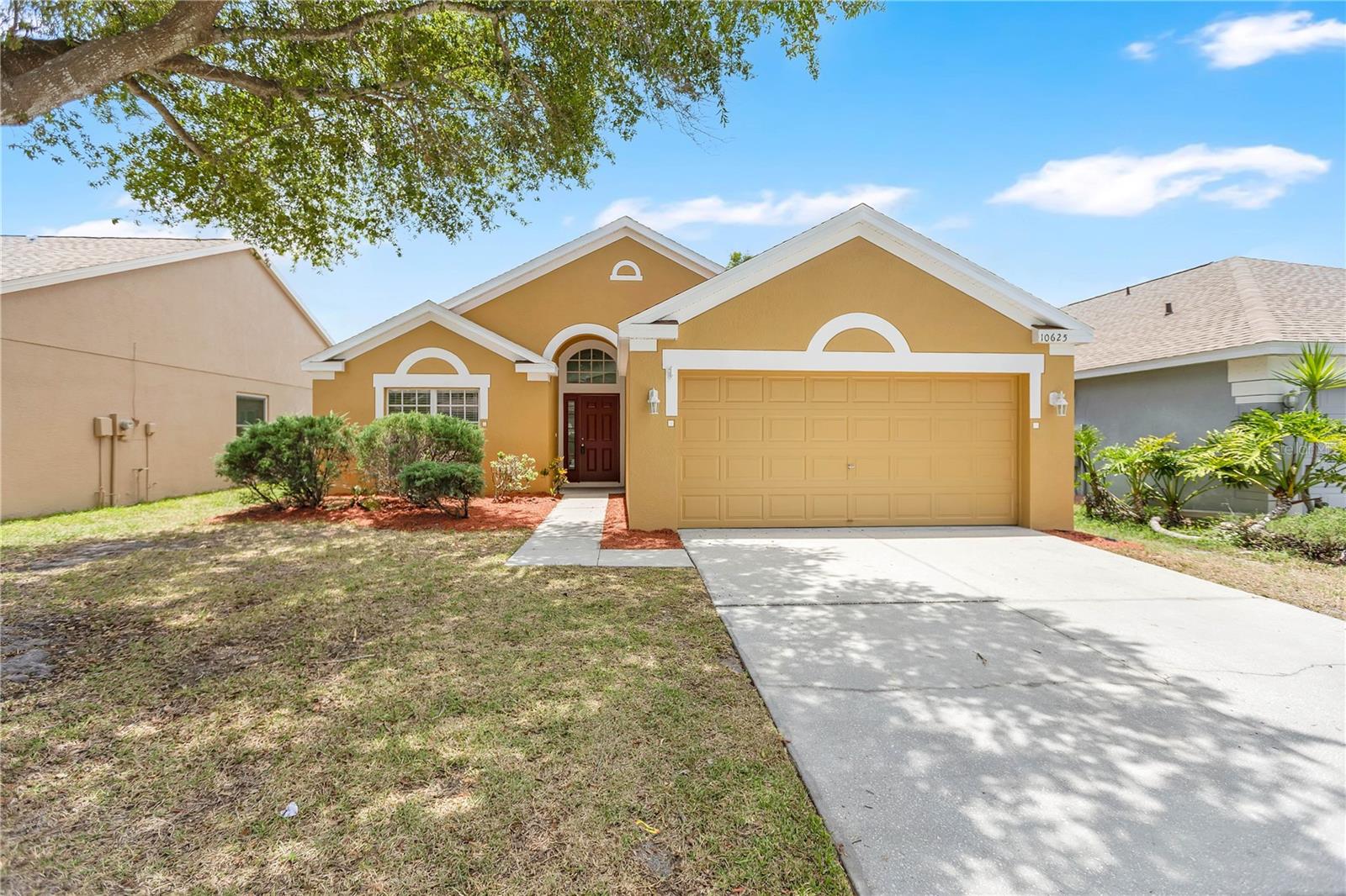 VR tour available. Up to $13,595 in seller credits toward closing costs, prepaids, or an interest rate buydown. Move-in ready 4-bedroom, 2-bath home with peaceful pond views, a fully fenced backyard, and a NEW ROOF (2025), HVAC (2020), water heater (2023). The just-completed refresh includes fresh interior paint throughout, new bedroom carpet, a new range, new LED lighting, new bath fixtures and vanity lighting, a freshly painted garage, and refreshed landscaping with fresh mulch. The split-bedroom floor plan offers high ceilings and a spacious great room with sliding glass doors to the covered patio. The centrally located kitchen offers abundant cabinet space, a breakfast area, and overlooks the main living space. The private primary suite includes a walk-in closet and an en suite bath with dual sinks, a garden tub, and a separate shower. Three additional bedrooms, an inside laundry room, and a two-car garage complete the home. Enjoy the fully fenced backyard overlooking the tranquil pond. South Pointe offers two community pools, playgrounds, a low HOA, and no CDD, with easy access to Tampa, MacDill AFB, I-75, I-4, the Selmon Expressway, shopping, dining, and schools. Buyer credit available with use of Seller's preferred lender. Schedule your showing today.