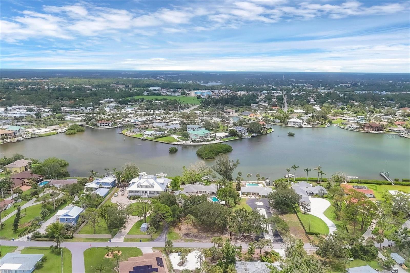 1+ACRES DIRECTLY ON LYONS BAY! Spectacular boating water & view. NO BRIDGES TO GULF OR INTRACOASTAL WATERWAY. All this plus...


Secluded & Private setting on which you can build your DREAM HOME or remodel the existing home. UPDATED KITCHEN with MARBLE counter tops & beautifully finished white cabinetry. WOLF gas range & VIKING refrigerator. 6X7 room with pecky cypress walls off living area, perfect for a bar! Enormous game room with 1/2 bath & French doors leading out to pool. HUGE home with 5 bedrooms & 4+baths. 2 story garage with 1/2 bath. Over-sized room above garage with skylights & separate ac, perfect for STUDIO or bedroom.  The POTENTIAL IS ENDLESS. Double primary bedrooms. Charming bay windows add to enjoyment of watching sunrises, dolphins play, or soothe-the-soul water views. So many PRIVATE areas to enjoy the SOLITUDE & view. QUINTESSENTIAL OLD FLORIDA with charm & character. BREATHTAKING SUNRISES. Huge 14x38 pool, pool area is 61x23. Separate hot tub. 


EXOTIC LANDSCAPING waiting to be touched up. A gardener's paradise. Large open patio in back, welcoming courtyard in front. Huge side yard with arched block for privacy. Can be accessed thru sliding doors from one primary bedroom. No cage on pool. CONCRETE SEAWALL with dock. SEPARATE BOAT SLIP/BASIN with DAVITS.


PRIVATE & PEACEFUL, yet only MINUTES TO THE GULF, jetty & drum circle, Pop's Sunset Grill or Pelican Alley. Conveniently located between Sarasota & Venice, with easy access to US41 or I75.  There is so much to this home, it's impossible to describe. A MUST SEE for any boating enthusiast, water lover, or someone craving a project. OUTSTANDING LOCATION.