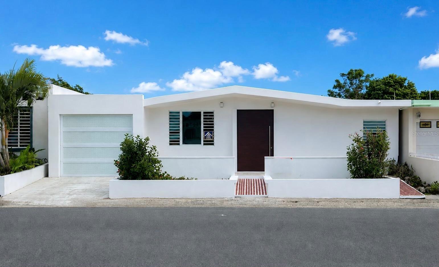 Tucked away on a quiet, peaceful street in the heart of Villa Carolina, this beautifully remodeled 1,172 sq. ft. home offers the perfect blend of comfort, style, and functionality.
The spacious layout features four bedrooms, two bathrooms, a generous living and dining area, and a versatile bonus room ideal as a family room, home office, or playroom. Every detail has been thoughtfully updated in 2026 with high-quality materials — from the fully renovated kitchen to the sleek bathrooms appointed with PVC vanities.
Sitting on a 330 sq. meter lot with a two-car garage, the property offers plenty of space inside and out. Additional highlights include diamond-polished floors throughout, security doors and windows for added peace of mind, and a newly rebuilt roof complete with a sealant warranty — giving buyers full confidence in their investment from day one.
Just minutes from shopping, dining, schools, and major highways.