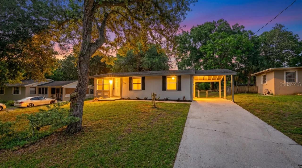 Tucked into a growing part of DeBary, this 2-bedroom, 1-bath home at 133 Colomba Rd offers a comfortable, easy-to-manage space with thoughtful updates that make everyday living feel simple and enjoyable.
Inside, the 798 square feet are used well, with new flooring underfoot and a freshly painted interior that gives the home a clean, refreshed feel from the moment you walk in. The kitchen flows naturally toward sliding glass doors that open to a screened-in back porch—an ideal spot for morning coffee or unwinding in the evening while overlooking the fully fenced backyard.
The bathroom has been nicely updated with a granite countertop and a newly tiled walk-in shower, bringing a modern touch to the home without overcomplicating it. Just off the back of the house, the laundry area connects directly to a spacious carport that easily accommodates two vehicles, making day-to-day routines more convenient.
Outside, the .26-acre lot gives you room to spread out, garden, or simply enjoy the privacy of a large backyard. The front landscaping is fresh and low-maintenance, adding to the home’s overall ease of care. Major updates have already been taken care of, including a newer roof (2020), along with updated water heater and HVAC systems, offering peace of mind for the next owner.
With quick access to SunRail, I-4, shopping, and dining, the location keeps you connected while still offering a quieter place to call home.
If you’ve been looking for a home that’s straightforward, well-kept, and ready to enjoy without a long to-do list, this one is worth a closer look.