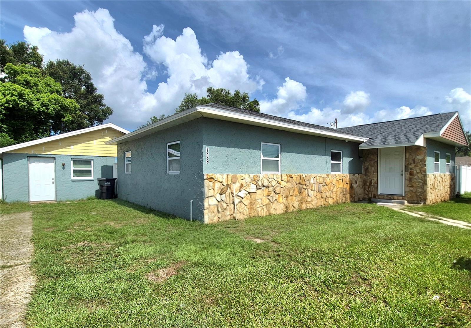 This is it!!! Rent one and live in the other! Whether you're an investor looking to add to your rental portfolio or a multi-family wanting to stay together, this is the place for you! Within minutes from all the great amenities in the University area of Tampa Bay! Sitting on a beautiful 0.28 acre lot, and zoned RDC-12, are two homes. The owner has just put in a Brand new Septic and Drain field, as well as a new Well Pump. The HAVC unit in the main home was replaced in 2025 and the Roof on the Main home was Re-shingled in 2020. The roof on the Mother-in-Law suite was re-shingled in 2024 and decking on the property was replaced in 2023.
The Main home totals 1,325sqft and features an open floorplan with Kitchen/Living/Dining Combo. It has 4 bedrooms and 2 full bathrooms. Ceramic tile is laid throughout the entire home. The kitchen features a brand new Stainless Steel Refrigerator, a Stainless Steel Stove and Microwave, Granite Counters and soft close, Real Wood Cabinets. Just down the hall, you will find four, great-sized, bedrooms and 2 baths. The master bedroom features its own en-suite with a stand up shower stall and granite counters. 
The detached Mother-in-law suite totals 760sqft and features a newer roof, which was re-shingled in 2024. It has 1 bedroom and 1 full bathroom with a Living/Dining/Kitchen combo. It also features granite counters, soft close cabinets and ceramic tile throughout. With a little TLC and cosmetic work, this will ABSOLUTELY make THE PERFECT place to have and call YOUR OWN!
USF is a short commute as well as MOSI and the IMAX theater, Busch Gardens and Adventure Island. Within minutes/miles from all amenities such as Dining, Shopping, Amusements, Hospitals etc! Interstate 275 is located just around the corner, making your drive more convenient to I-4, Downtown Tampa/St Pete and Clearwater areas. 
OPPORTUNITY AWATIS!!! DON'T MISS OUT!!! Call to schedule your tour today!