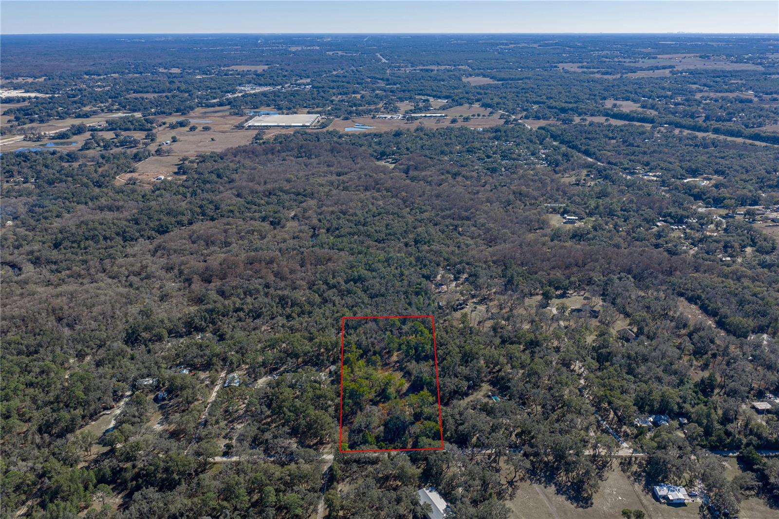 The perfect site for your dream home awaits on this 5 acre wooded parcel in north Dade City offering a
blank slate for someone who wants land without HOA restrictions. Zoned agricultural and free of any
HOA, the property allows for either a mobile home or a single-family residence. Mature trees provide a
natural setting and a sense of separation from neighboring parcels, making it well suited for a personal
homesite, or agricultural use. It has just the right touch of a rural feel, while still being just a short ride to
local conveniences and hotspots. No impact fees have been paid, no well or septic onsite. Give us a call
today to find out if this property is the one you have been looking for!