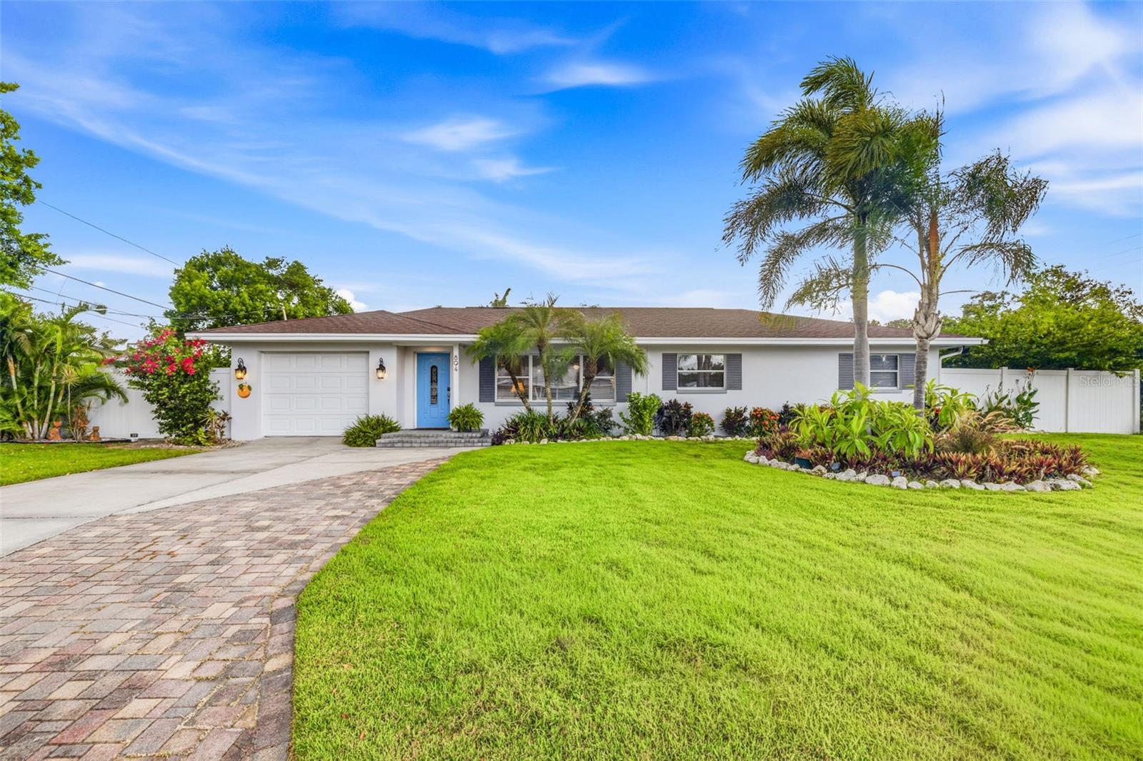 Welcome home to this beautifully updated pool home in the highly sought-after Dunedin Manor neighborhood, where coastal charm meets everyday convenience. Perfectly positioned just 1 mile from the heart of Downtown Dunedin, you'll love living in one of Florida's most desirable golf cart-friendly communities. Cruise to locally owned restaurants, rooftop bars, craft breweries, boutique shopping, coffee shops, waterfront parks, live music, and the countless festivals that make Dunedin such a vibrant place to call home. Situated on a beautifully landscaped corner lot, this 3-bedroom, 1-bathroom home offers nearly 1,500 square feet of thoughtfully designed living space. As you step inside, gorgeous laminate wood flooring flows throughout the spacious living and dining room combination, creating a warm and inviting atmosphere. Renovated in 2019, the kitchen is sure to impress with granite countertops, abundant wood cabinetry, a Frigidaire glass cooktop with stainless steel vent hood, stainless steel appliances, a wet bar sink, and a built-in wine refrigerator. A charming eat-in dining area showcases beautiful wood ceiling detailing and French doors that open directly to the backyard, seamlessly blending indoor and outdoor living. French doors lead into the spacious primary bedroom, while the additional bedrooms offer comfortable accommodations for family or guests. The updated bathroom features an oversized vanity and a tub/shower combination. An office or study nook provides the perfect work-from-home space. An interior laundry room with a utility sink and ample storage adds everyday functionality. Step outside to the backyard you've been dreaming of. Designed for entertaining and enjoying Florida's year-round sunshine, the spectacular outdoor living space features a free-form saltwater pool surrounded by an expansive paver deck. Complete with a tranquil fountain, sun shelf with a built-in umbrella holder, and a brand-new 2025 pool pump, this private backyard oasis is equally suited for relaxing afternoons or hosting family and friends. A storage shed provides additional space for tools, pool equipment, or outdoor gear. Built with solid block construction and located in flood zone X, where flood insurance is not required, this home also offers valuable peace of mind with major updates already completed, including a new HVAC system (2025), complete home replumb (2026), and tankless water heater (2022). Living in Dunedin Manor means embracing the Florida lifestyle. Outdoor enthusiasts will appreciate being just minutes from the Pinellas Trail, Edgewater Park, TD Ballpark, home of the Toronto Blue Jays' spring training, and the award-winning beaches of Honeymoon Island State Park. Enjoy easy access to grocery stores, shopping, medical facilities, and countless dining options, while Clearwater, Palm Harbor, Safety Harbor, and Tampa are all just a short drive away. Whether you're searching for a primary residence, vacation home, or seasonal retreat, this is the one for you. Schedule your showing today!