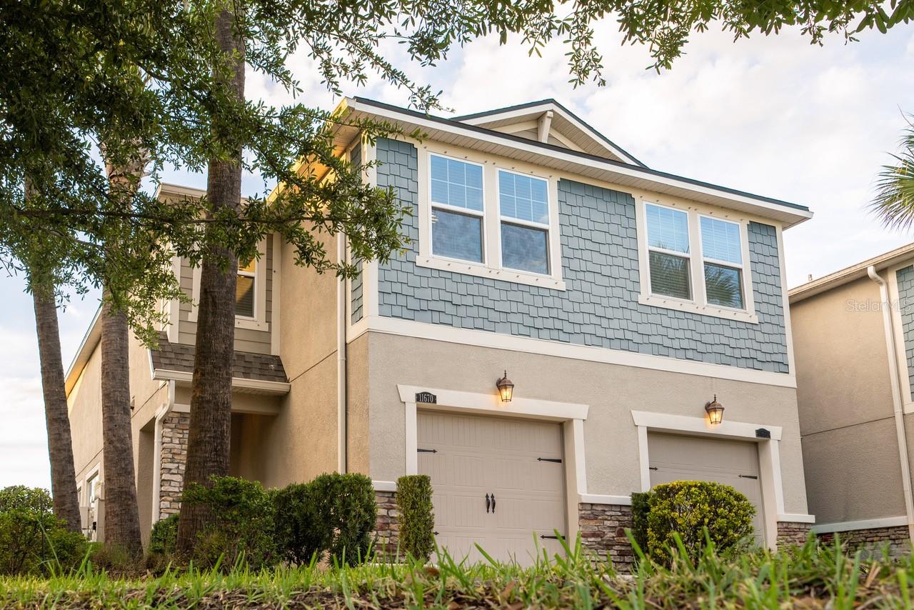 MOVE IN READY 3 bedroom 2.5 bathroom END UNIT townhome in the highly sought after gated community of Boyette Park. Gourmet kitchen with granite counters, large island, and stainless steel appliances. Ceramic tile floors throughout main level. Spacious primary retreat featuring 3 walk in closets and en-suite bathroom with dual vanities. Versatile upstairs loft space, perfect for play room, media room, office, offering unlimited flexibility! Showroom quality 1 car garage featuring a BRAND NEW (MAY 2026) durable hybrid epoxy/polyaspartic floor coating and massive commercial grade 8x4 garage storage rack. Townhome has an unusually high amount of storage space overall. 2 car driveway and extra guest parking spots nearby. All major appliances included. Newer washer/dryer (2024). Double sliding glass doors lead to screened in lanai with peaceful views and no backyard neighbors! Low maintenance with HOA covering lawn care, trash and recycling pick up, and roof. HVAC recently serviced (MAY 2026). Boyette Park offers lots of great community amenities including pool with splash pad, scenic lake views, fire pit and grilling area, dog park, playground, and walking paths. One or more photo(s) has been virtually staged