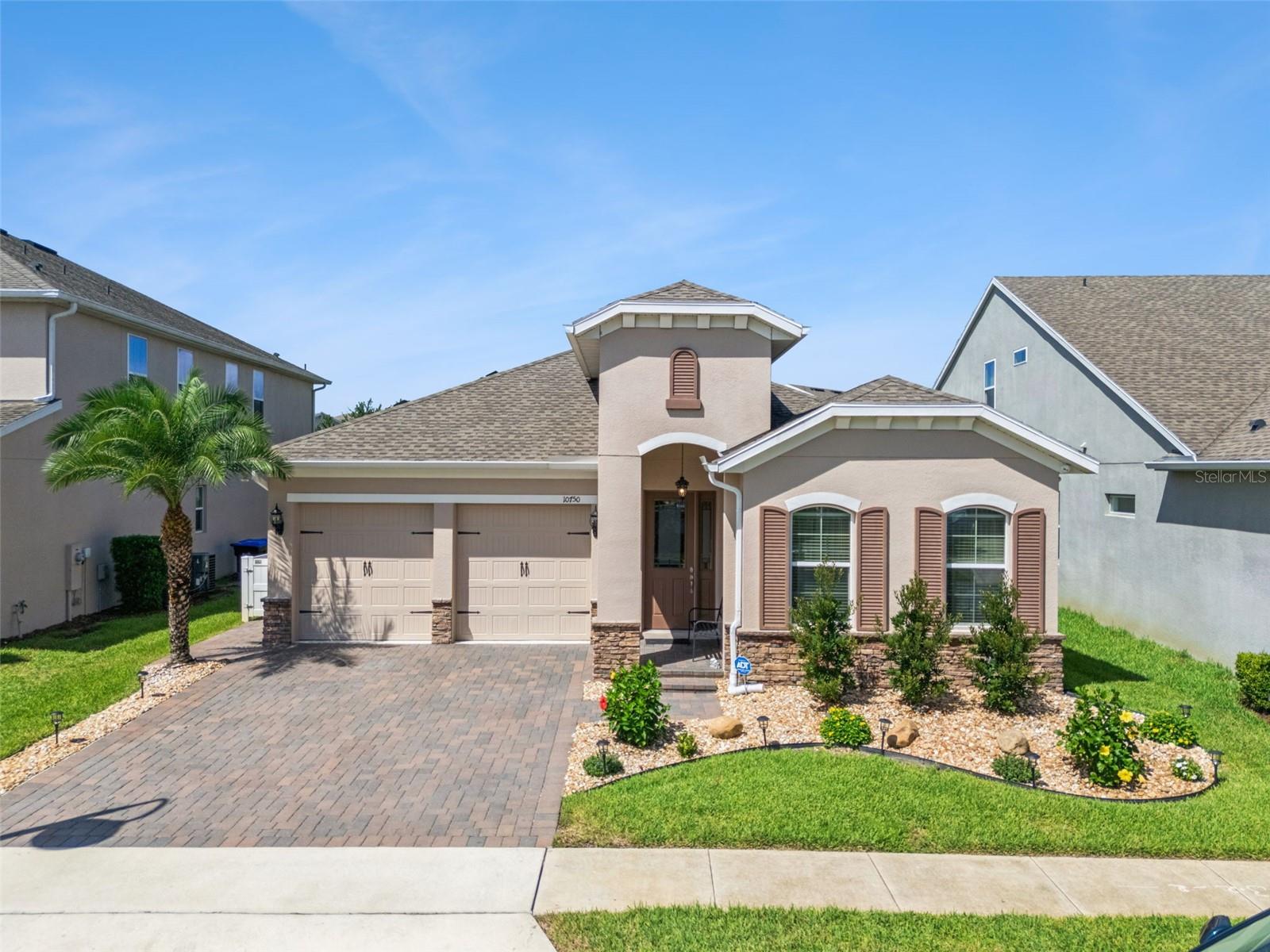 Welcome to this beautifully upgraded 2020-built home in Horizon West offering 3 spacious bedrooms, 2.5 bathrooms, and a thoughtfully designed floor plan that blends style, comfort, and functionality. From the elegant formal living room to the expansive great room that seamlessly connects the kitchen, dining, and family areas, this home is perfect for both everyday living and entertaining.The heart of the home is the stunning chef's kitchen, featuring an oversized island, custom range hood, upgraded cabinetry with crown molding, and abundant workspace for cooking and gathering. Luxury tile flooring, upgraded in 2025, flows throughout the entire home, while crown molding, oversized baseboards, and decorative hallway columns add timeless architectural detail throughout the home.The spacious owner's suite offers a beautifully renovated spa-inspired bathroom, fully upgraded in 2026, creating a private retreat you'll love. A convenient Jack-and-Jill bathroom serves the secondary bedrooms, providing both functionality and privacy for family or guests.Outside, enjoy the screened lanai complete with sun shades, overlooking a fully fenced backyard with elegant iron fencing. Additional exterior features include an extended driveway, whole-home security camera system, and solar panels installed in 2022 for enhanced energy efficiency.Additional upgrades include a whole-home water softener system with reverse osmosis filtration in the kitchen, a dedicated garage outlet for an additional refrigerator or freezer, and numerous custom finishes that make this home truly move-in ready.With modern upgrades, exceptional attention to detail, and an ideal layout, this home offers the perfect combination of luxury, efficiency, and everyday comfort. Don't miss the opportunity to make this exceptional property your next home!