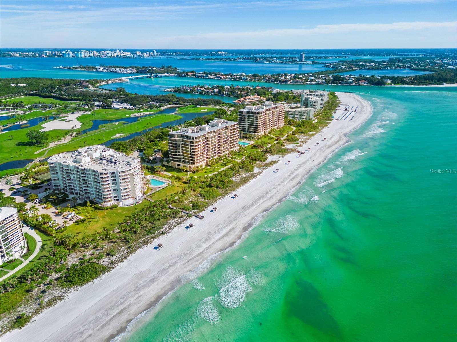 Welcome to this most desirable Pierre residence located behind the gates of the prestigious Longboat Key Club on south Longboat Key. This stunning property has recently undergone extensive updates, including new engineered hardwood flooring throughout, all new bathrooms with Corinthian stone tile, and a primary bath that now features a sauna and oversized shower with bench and rain showerheads for two! The kitchen has been expertly renovated with new appliances, custom cabinetry, quartz counters and a partial wall removal opening to the living area and maximizing the breathtaking water and sunset views. This residence offers west and southern exposures, allowing for plenty of natural light throughout the day. Enjoy sunbathing or relaxing with a good book in the gulf breezes from one of the four terraces. With 3 bedrooms, 3.5 baths, and over 3,685 square feet of living space, there is plenty of room to entertain guests or simply enjoy the surroundings. Other updates include the addition of the Lutron Lighting System with new lighting throughout, a Sonos Speaker System throughout and a new wet bar in the main living area with wine referigerator and custom cabinetry. The community itself offers a range of resort-style amenities, including a Gulf-front heated pool and spa, 2 Har-Tru tennis courts, 3 hospitality guest suites, an updated fitness facility, a clubroom with a bar, a conference room, 24-hour concierge services, and private access to 420 feet of pristine white sand beach. Two under building parking spaces and private storage are included with the purchase of this unit. Experience the ultimate Longboat Life at The Pierre, where luxury and captivating views await.