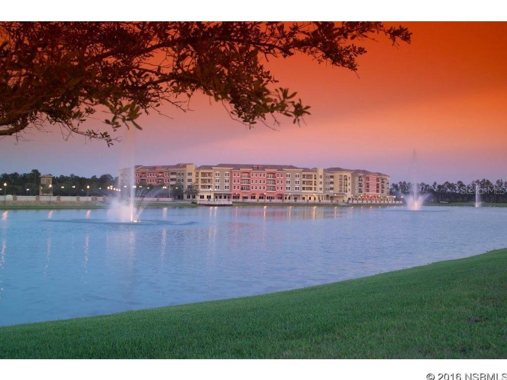 4th floor water front unit. tile flooring in all main areas, Kitchen with granite counters.  1 car garage with add apron parking. storage closet next to unit. plenty of shops and eateries now open in Town Center