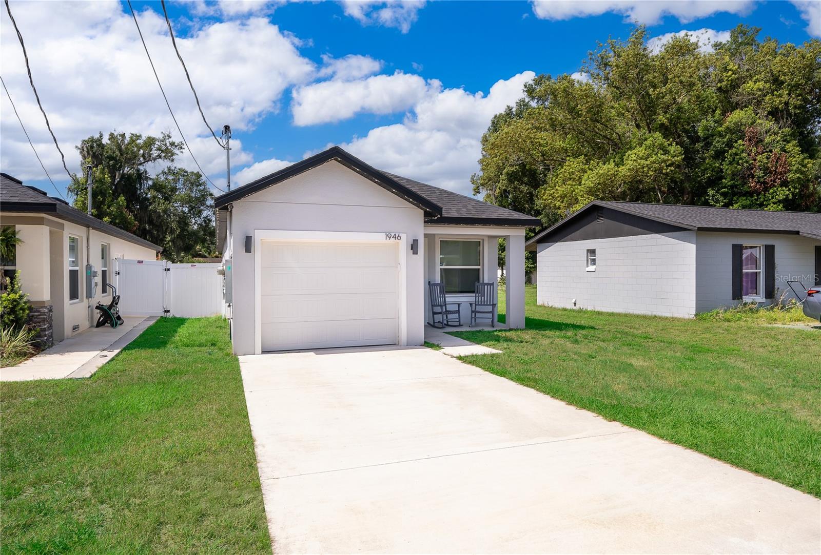 This attractive 3 bedroom & 2-bathroom home showcases a pleasing Landscape & Curb Appeal. As you enter, you are welcome by the spacious open Living/Dining combination floor plan that invites the family to gather around the beautiful kitchen island. The Kitchen comes completely equipped with stainless steel appliances (Refrigerator, Range, Garbage Disposal, Dishwasher & Microwave) included. Solid Wood Shaker Style Cabinetry and Quartz Stone Counter Tops are a few of the many upgrades this model has to offer. And for those working from home! a cozy home office with a built-in desk to conduct business. The newly sodded backyard offers privacy and plenty of room for entertainment. Schedule your private showing today!