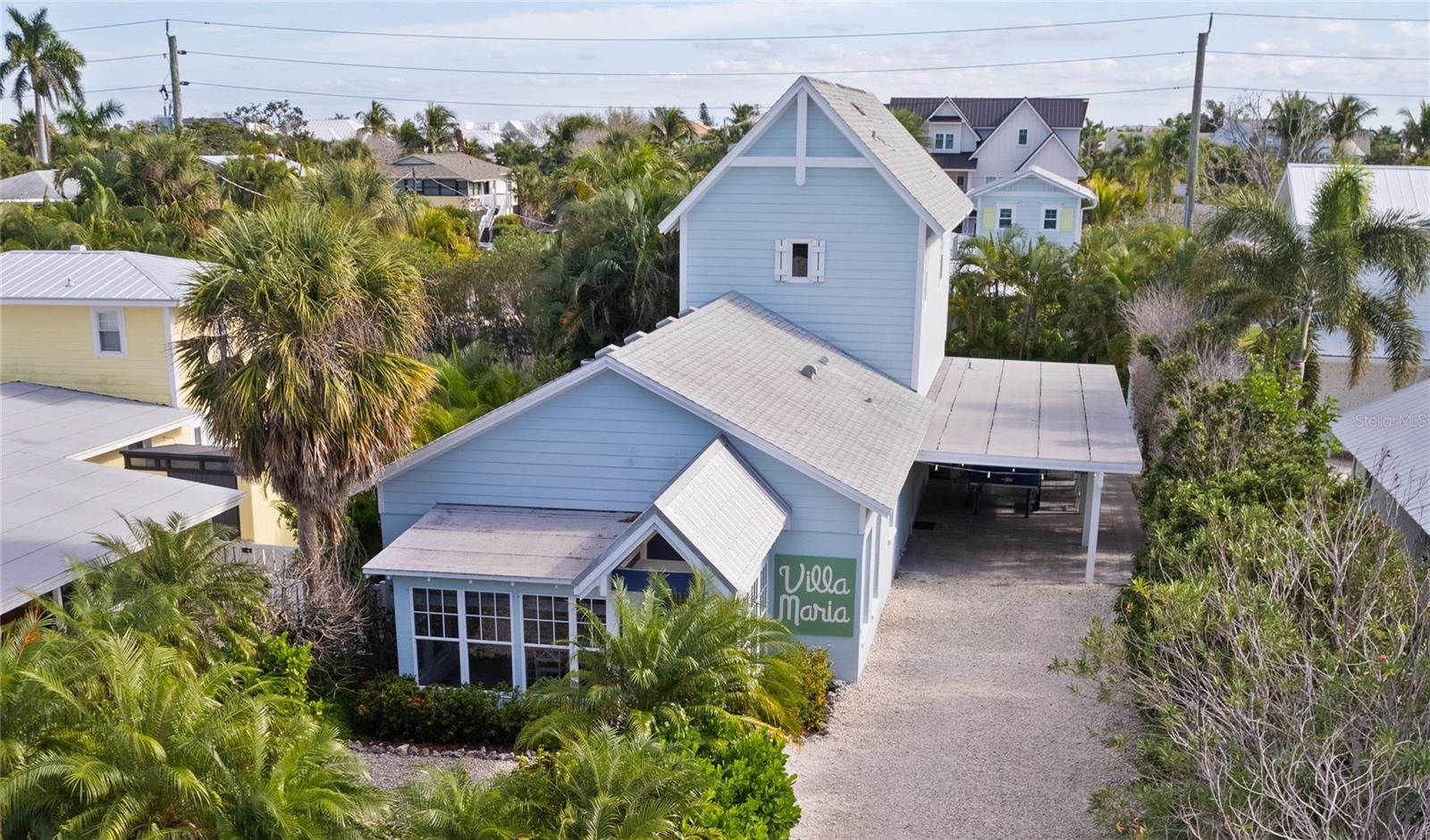 ~~~~~ PRICE DROP ~~~~~  Come take a look at this amazing Anna Maria home ready for you and your family to come live in paradise. Villa Maria is ready for you! An amazing 3 bedroom, 2 bathroom and a half bath just 2.5 blocks away from some of the most coveted beaches in the country. This popular vacation rental is perfectly nestled in the city of Anna Maria. Walking distance, a bike ride or short golf cart ride to the beautiful beaches of the Gulf of Mexico where you can bask in the sunshine all day. Or take in one of the most amazing sunsets in the world. Villa Maria is also close to all the happenings on Pine Avenue. Take in the shopping and grab a bite at one of the delicious restaurants. Villa Maria has been beautifully remodeled with the upmost attention to detail and beauty. As soon as the home comes into view, you will feel its character and beach vibe. Walk through the carport, just past the outdoor ping pong table and you'll enter the home. With a clean bright fully equipped kitchen, a dining table that seats 6, and a cozy living room ready for family night.  Along with an additional family so the kids can have all the space they need for fun.  The beautiful primary bedroom and bathroom are up stairs and away from the all the action. You will feel as if you entered a spa and be able to escape and chill out whenever you need. The other two bedrooms are beautifully decorated and ready for the rest of the family and or friends. Enjoy dining in the sun soaked dining area inside or you can take the fresh catch outside to the outdoor dining area just off the incredible pool. With lush landscaping and the feel of privacy, you'll want to spend the day by the pool. Villa Maria is a very popular vacation rental and could be your ticket to Anna Maria Life. It’s beautiful, full of fun and close to it all.
