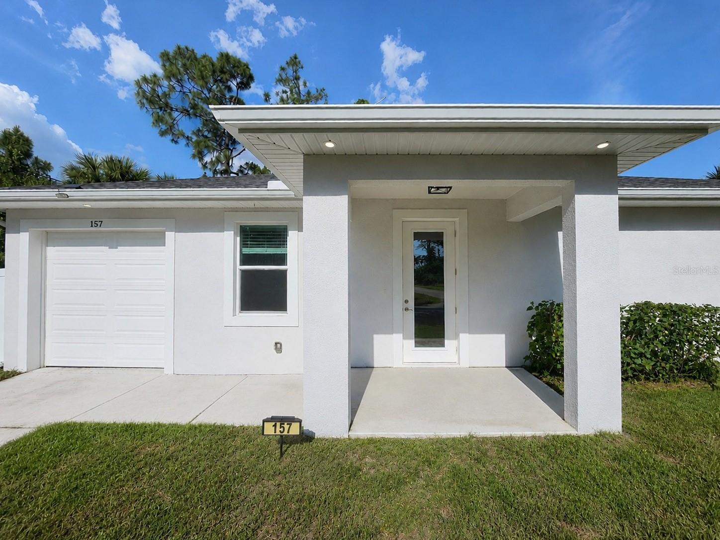 One or more photo(s) has been virtually staged. $10,000 SELLER CONCESSION —lUse preferred lender and qualify for up to $17,000 toward closing costs and/or down payment assistance, subject to buyer qualification and program terms. Gorgeous 2021-built home in Twin Lakes Estates offering MODERN FINISHES, EVERYDAY COMFORT, NO HOA FEES, NO CDD, and located OUTSIDE OF A FLOOD ZONE for added peace of mind with NO REQUIRED FLOOD INSURANCE. From the moment you step to the front door, you are welcomed by a covered entry that adds charm, curb appeal, and a warm inviting touch to the home. Features include TRAY CEILINGS, RECESSED LIGHTING, LUXURY VINYL PLANK FLOORING, QUARTZ COUNTERTOPS, SOFT-CLOSE WOOD CABINETRY, and MOEN FIXTURES throughout. The beautifully designed kitchen showcases STAINLESS STEEL APPLIANCES, a sleek tile backsplash, pendant lighting, and a large bar-style counter. The spacious primary suite offers a WALK-IN CLOSET and a spa-like bathroom with CUSTOM TILE WORK and a FRAMELESS GLASS SHOWER, while the guest bedroom also includes a walk-in closet and an upgraded tiled tub/shower combination in the guest bath. Additional upgrades include IMPACT-RESISTANT WINDOWS, a DEDICATED LAUNDRY AREA, SOFFIT LIGHTING, and SEAMLESS GUTTERS around the home. Step outside to a FULLY FENCED PRIVATE BACKYARD 6FT VINYL FENCE with mature trees creating a peaceful setting, plus an EXTRA STORAGE SHED in excellent condition for added convenience. This home is equipped with an ADT security system featuring door and window sensors connected to a touchscreen control panel installed in the living room. The current setup does not include additional cameras; however, exterior cameras can be added at the buyer’s expense if desired. The system is not currently active, but the existing equipment can be utilized and activated by the new owner under their own account for added convenience and security. Centrally located near shopping, dining, and Southwest Florida International Airport, this MOVE-IN READY home offers the perfect blend of newer construction, privacy, upgrades, and location. Original architectural/site plans available upon request.