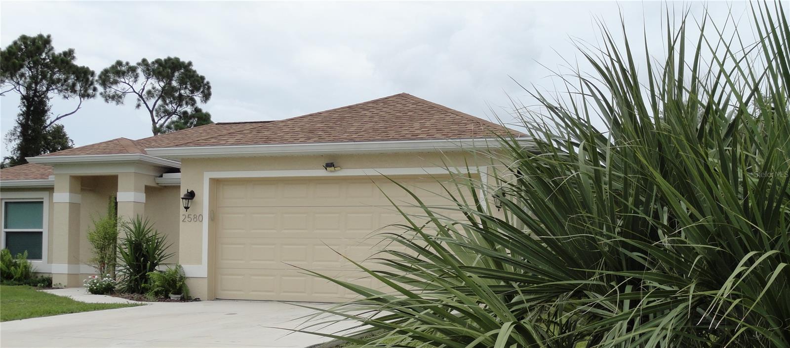 Beautiful 2022 Gulfstar Home backing to a peaceful greenbelt!  This meticulously maintained 3-bedroom, 2-bath home offers a bright, open split-bedroom floorplan with soaring vaulted ceilings and quality upgrades throughout.  Features include impact-resistant Low-E windows, full overlay cabinetry, granite countertops, and windowsills, stainless steel appliances, a kitchen purification system, porcelain tile throughout, and stylish new plumbing and electrical fixtures.  Built for comfort and efficiency, this home also boasts a screened lanai, 30-year dimensional shingles, a 3-zone irrigation system, and energy saving features designed to help keep insurance and utility costs lower.  
Located in one of North Port's desirable neighborhoods, you'll enjoy easy access to Wellen Park, Cool Today Park, (Atlanta Braves Spring Training), Gulf Beaches, shopping, dining, entertainment, hiking, biking, boating, fishing, and convenient access to I-75 and US-41.  This move-in-ready home offers the perfect combination of quality, location, and Florida lifestyle.  Schedule your private showing today!