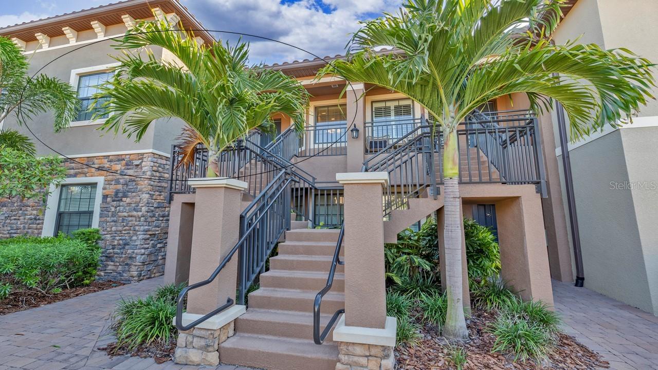 Used exclusively as a seasonal second home retreat and never rented, this condo is in immaculate condition. From the moment you step through the door, the 12.5-foot grand ceilings and breathtaking mid-fairway golf course views signal that you’ve arrived at something truly special. Voluminous space and soaring ceilings create an airy, expansive atmosphere. The gourmet-ready kitchen features 42-inch off-white cabinetry, sleek granite countertops, and a social breakfast bar, perfect for entertaining. Escape to the primary bedroom where you can unwind in a tranquil suite boasting double walk-in closets and a spa-inspired ensuite with dual sinks and a seamless step-in shower. Every inch reflects quality, featuring elegant crown molding, a convenient in-unit laundry suite, and the highly coveted addition of a private one-car garage. Live the ultimate Florida lifestyle and forget the waitlists with a Full Golf Membership to a Championship 18-hole course and a world-class golf center. This lifestyle is a 5-star resort experience with water & wellness. Relax at the heated lagoon-style pool with private cabanas. Grab a drink at the poolside Bahama Bar, or find your zen at the full-service Koquina Sand Spa. Enjoy active living with championship Pickleball, Tennis, and Bocce courts, plus a state-of-the-art fitness center with personal training and wellness seminars. Indulge in culinary excellence from casual dining at the Bahama Bar to elegant, fine dining at the Barrel House Bistro and Culinary Center. Welcome to Florida… Welcome to Esplanade… Welcome Home. All furniture and golf cart in the garage are negotiable.
