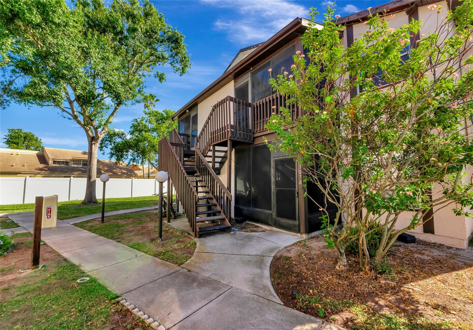 This warm and inviting second-floor condo offers 2 bedrooms and 2 bathrooms, perfectly blending comfort and convenience in a prime location near the State College of Florida and IMG Academy. Enjoy quick access to local dining, shopping, and entertainment while benefiting from a low-maintenance lifestyle ideal for long-term living.

The home features newly installed luxury vinyl plank flooring throughout, a spacious living area, and a primary bedroom with a large walk-in closet. Recent upgrades include a new A/C unit ,updated bathroom fixtures and brand new exterior stairways.The screened-in porch provides additional storage and includes a washer and dryer for added convenience.

The HOA covers exterior maintenance, lawn care, trash service, pest control, and upkeep of the community amenities, allowing residents to enjoy a truly hassle-free lifestyle. Community amenities include a pool, spa, fitness center, and tennis courts, all professionally maintained.

This well-managed, predominantly owner-occupied community has association guidelines designed to promote long-term stability, quality, and pride of ownership. As part of the approval process, the association typically looks for a credit profile around a 680 score for purchase. NO RENTAL WAIT PERIOD. Great for investors prime desirable location.

Please note, the condo association is currently scheduled to update the exterior paint and the brand new stairways are already completed.